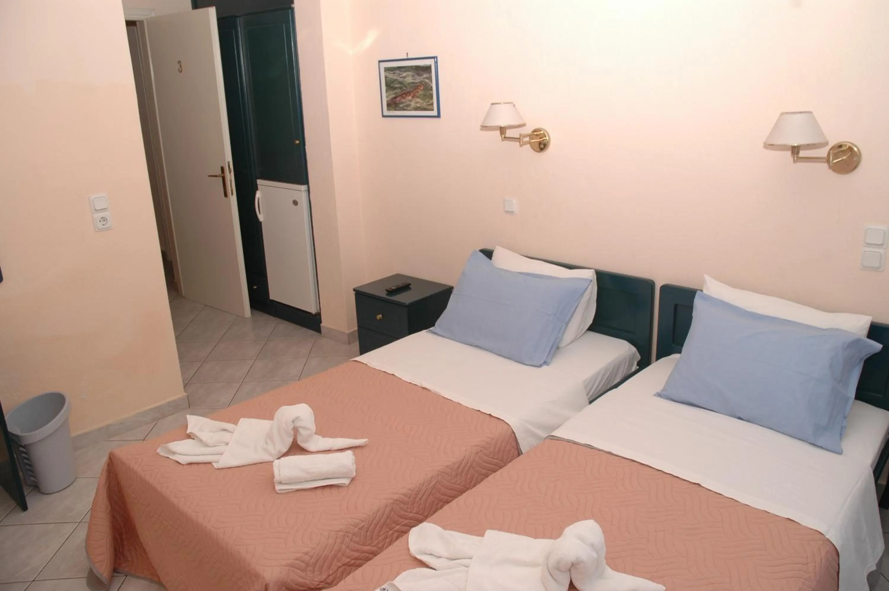 Bed in Agnanti Hotel