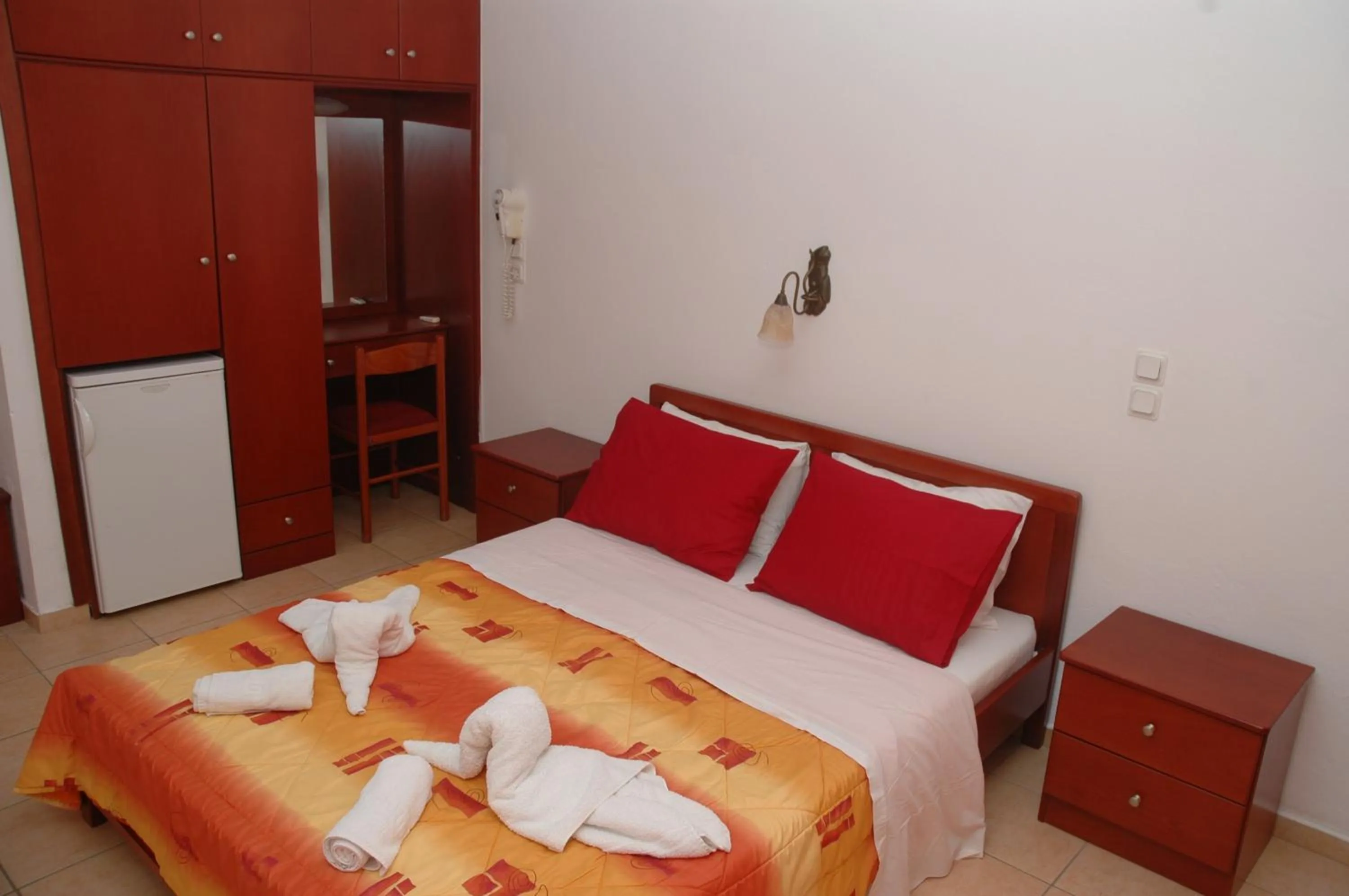 Bed in Agnanti Hotel