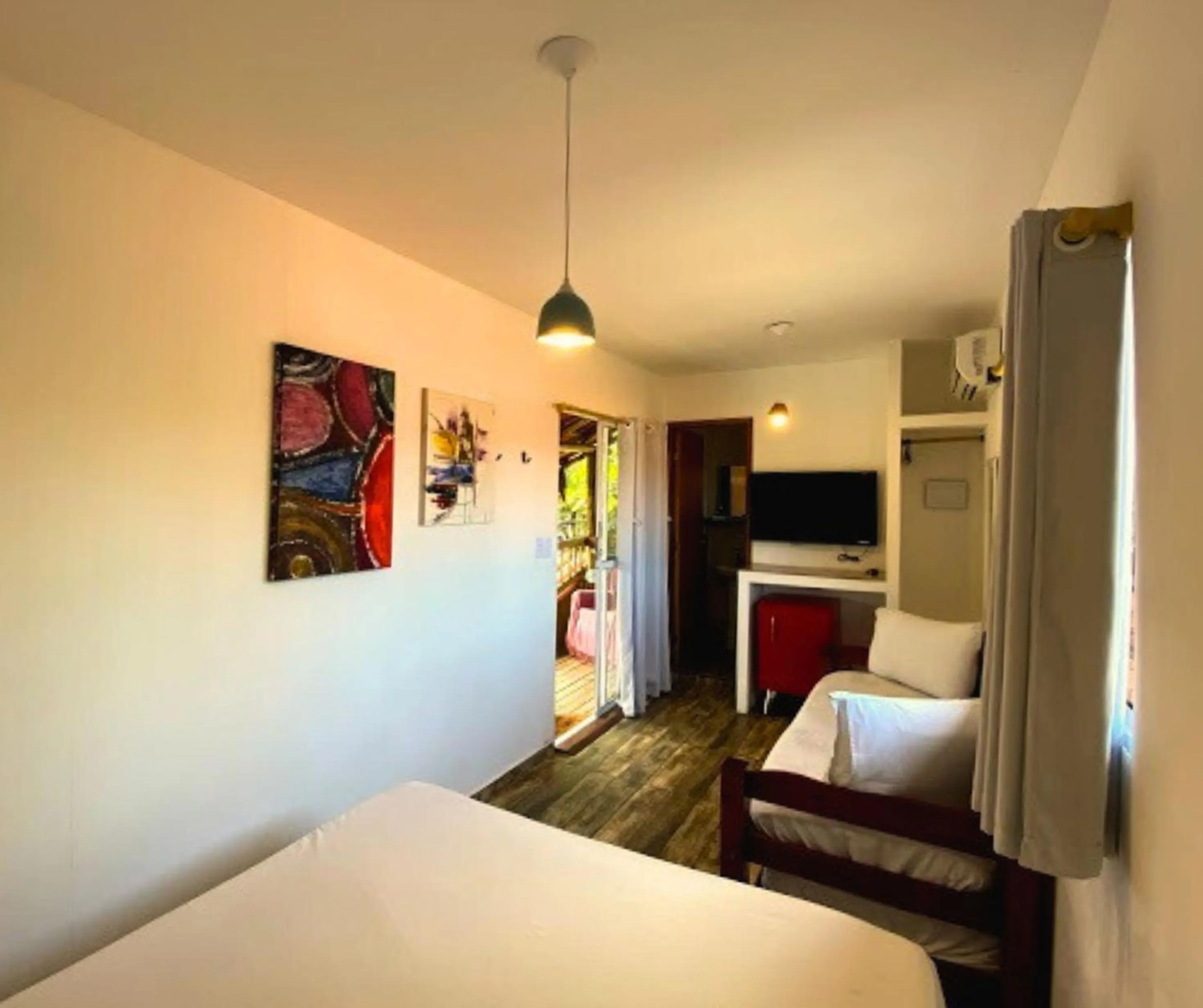 Bed in Pousada Papaya Container