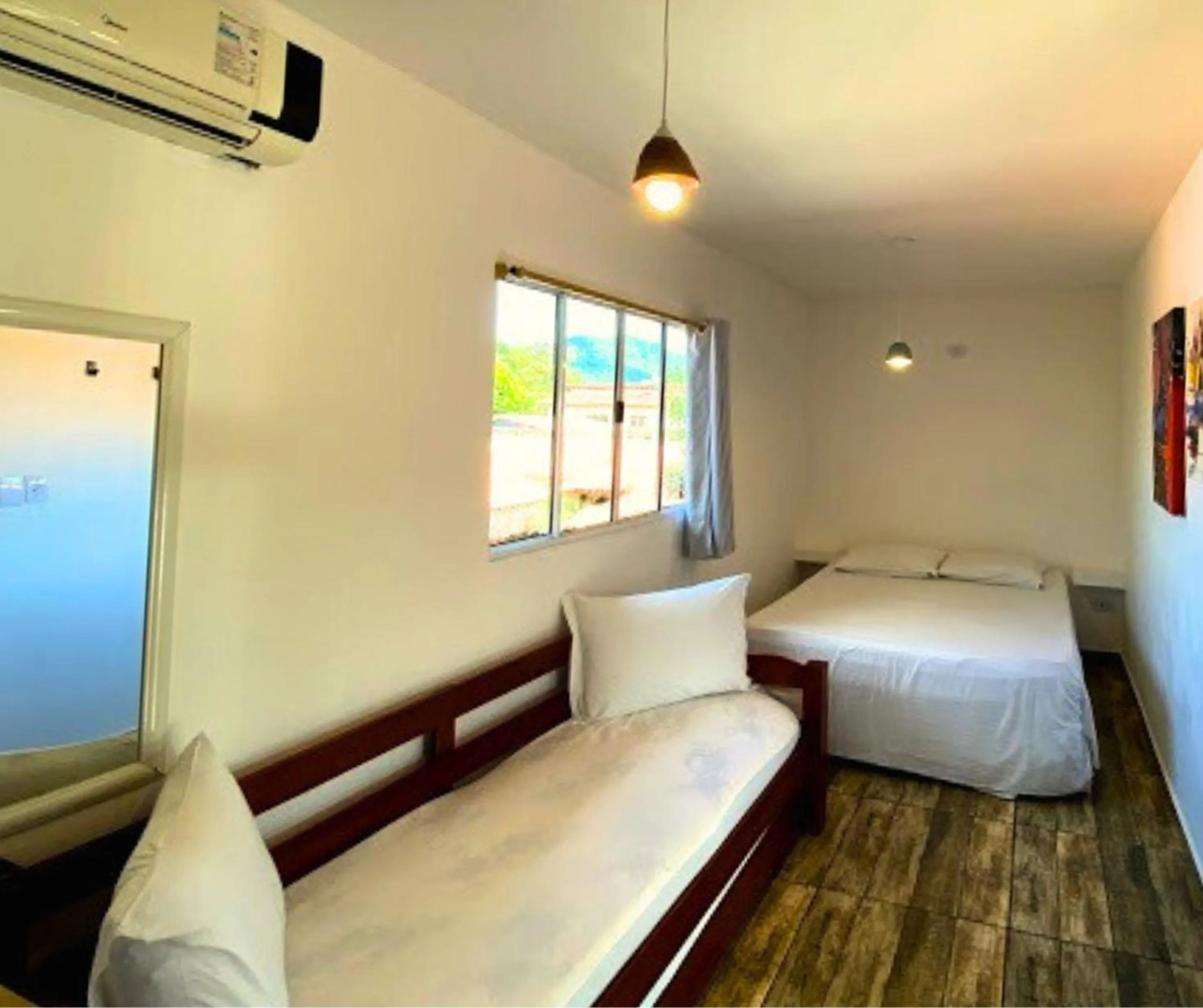 Bed in Pousada Papaya Container