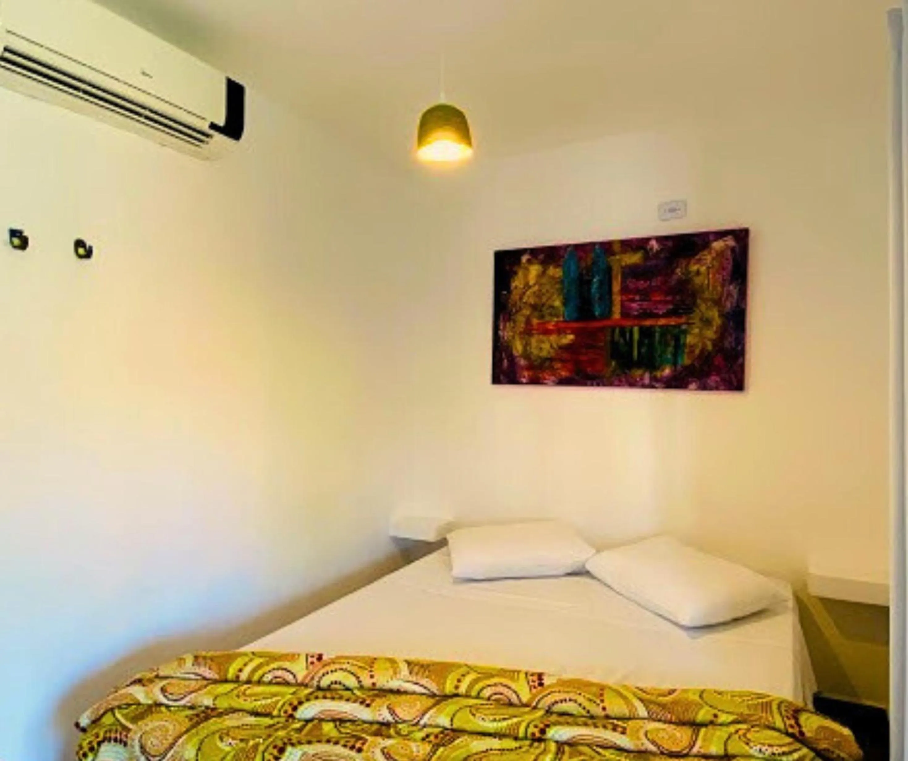 Bed in Pousada Papaya Container