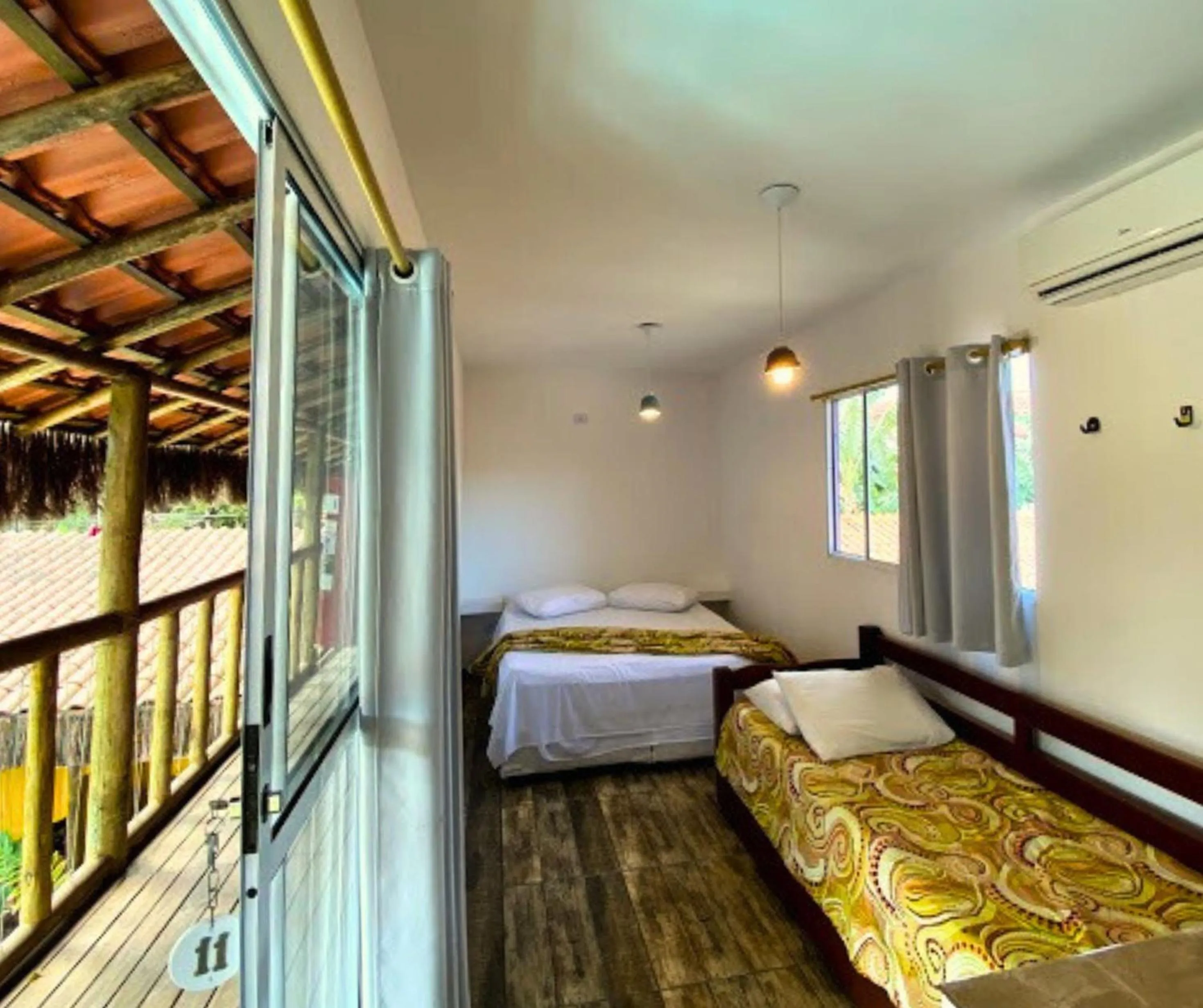 Bed in Pousada Papaya Container