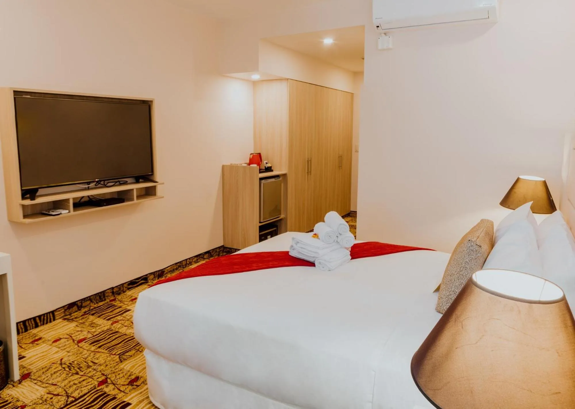 Bed in Nobility Grand Hotel