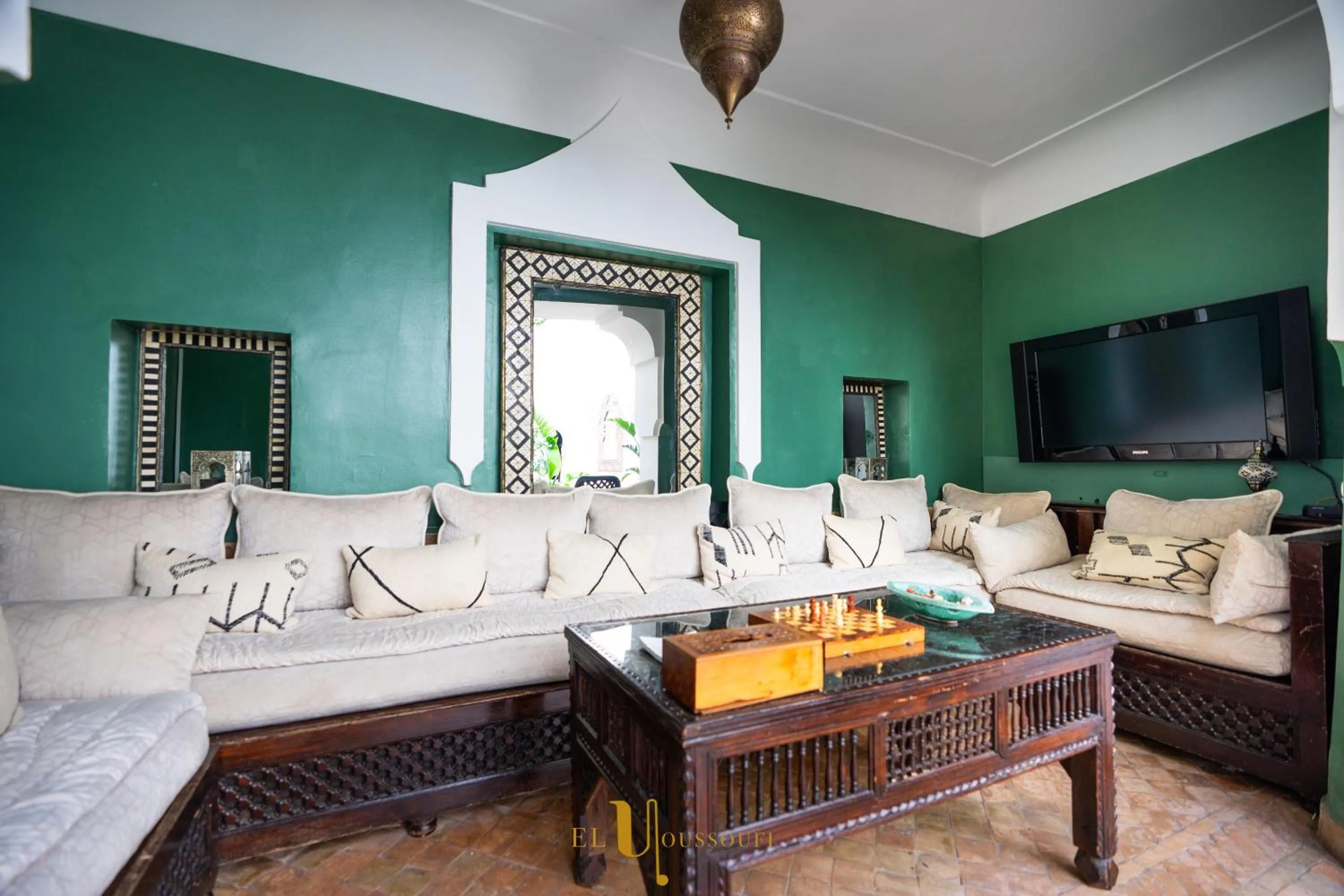 Communal lounge/ TV room in Riad El Youssoufi