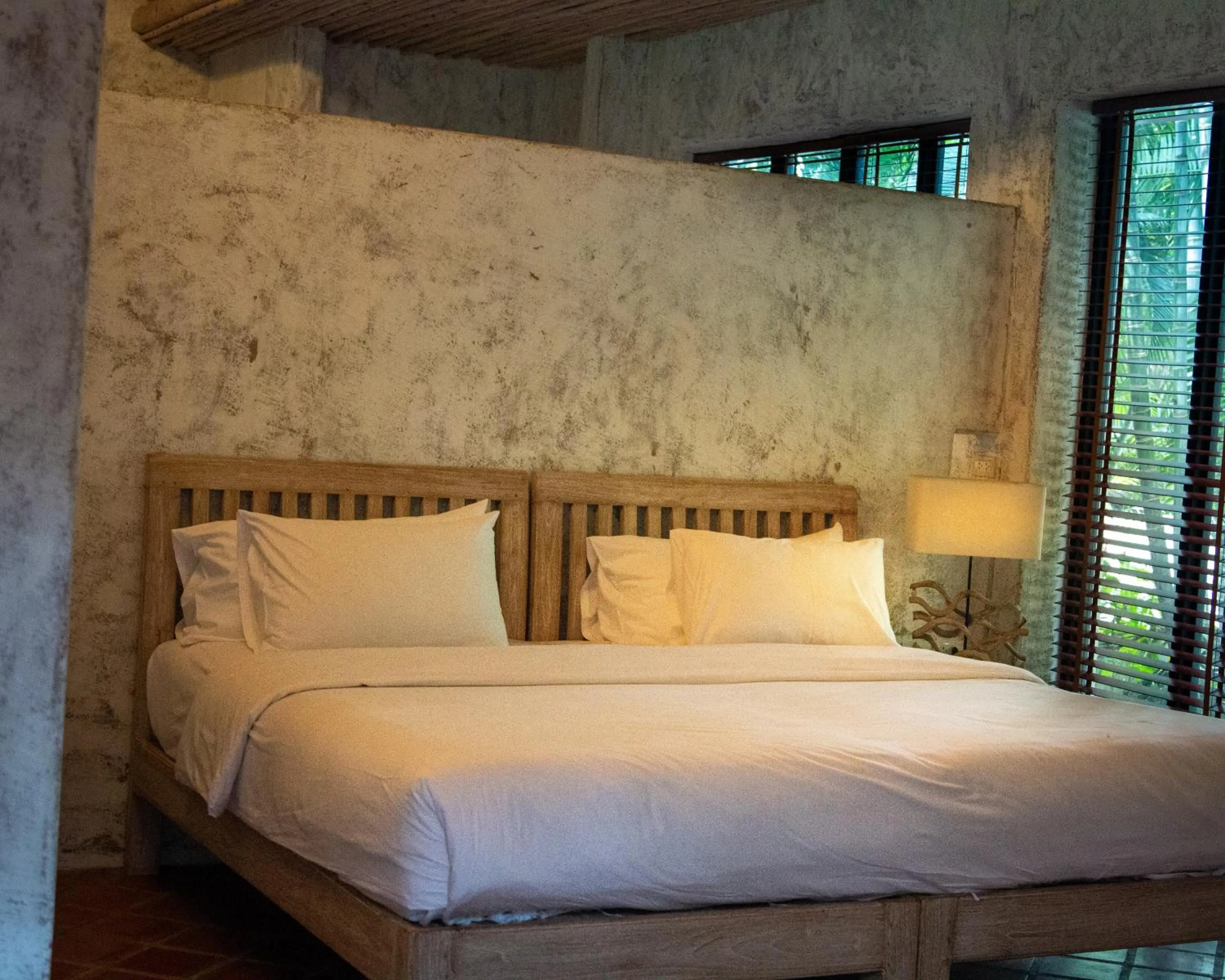 Bed in Baanpong Lodge