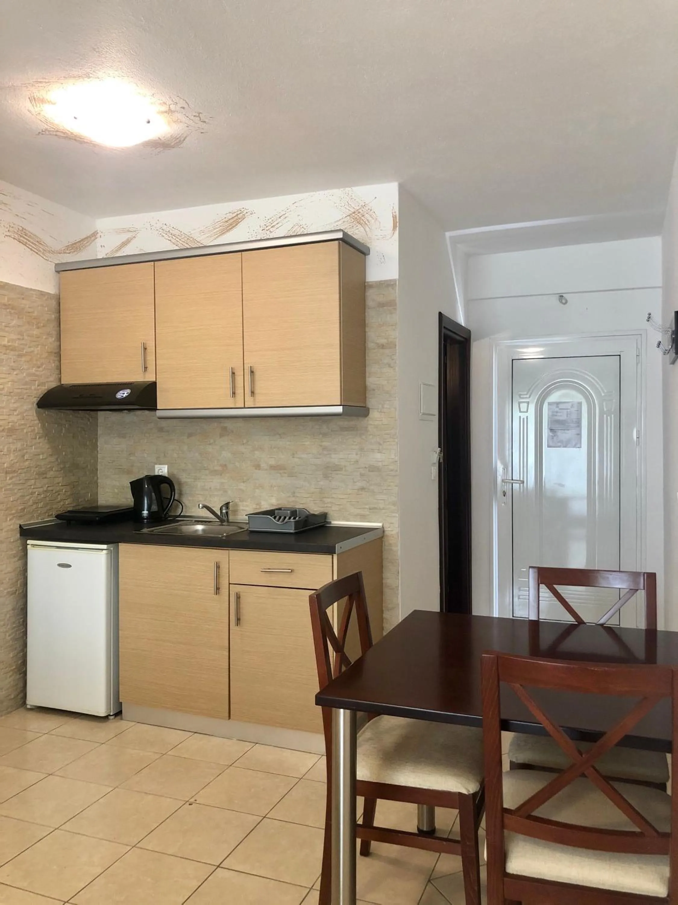 Kitchen or kitchenette in Melis Studios