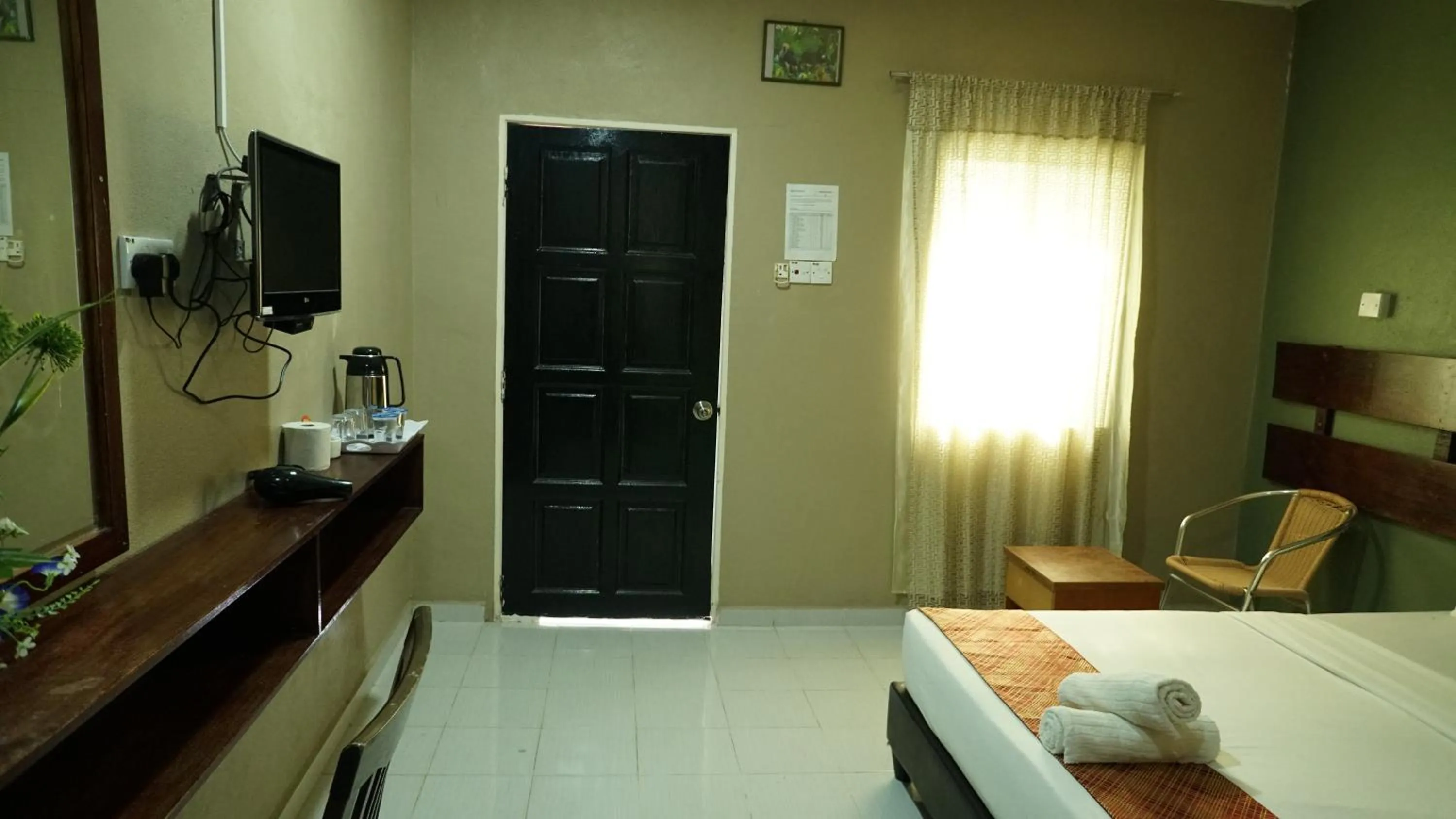 Bed in Pondok Muara Chalet