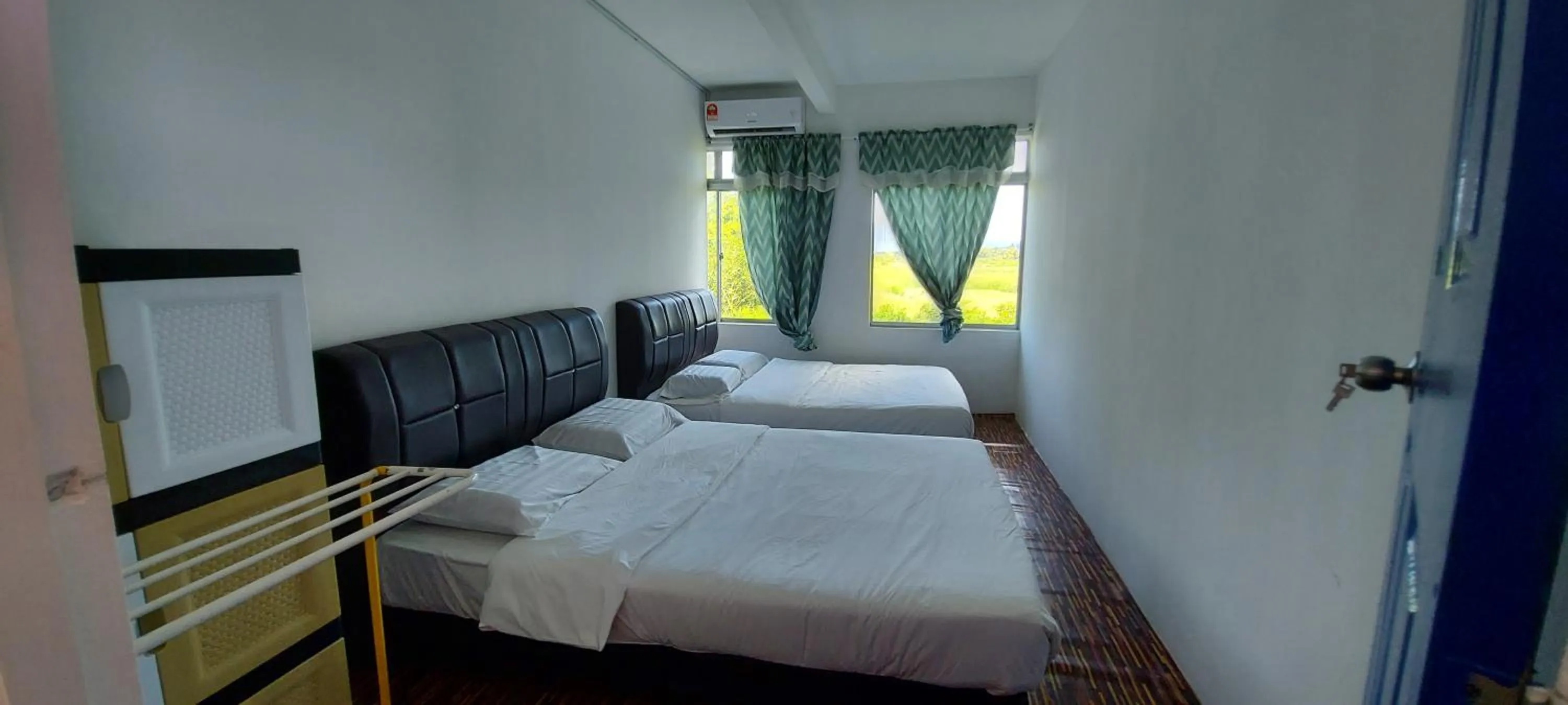 Bed in Pondok Muara Chalet