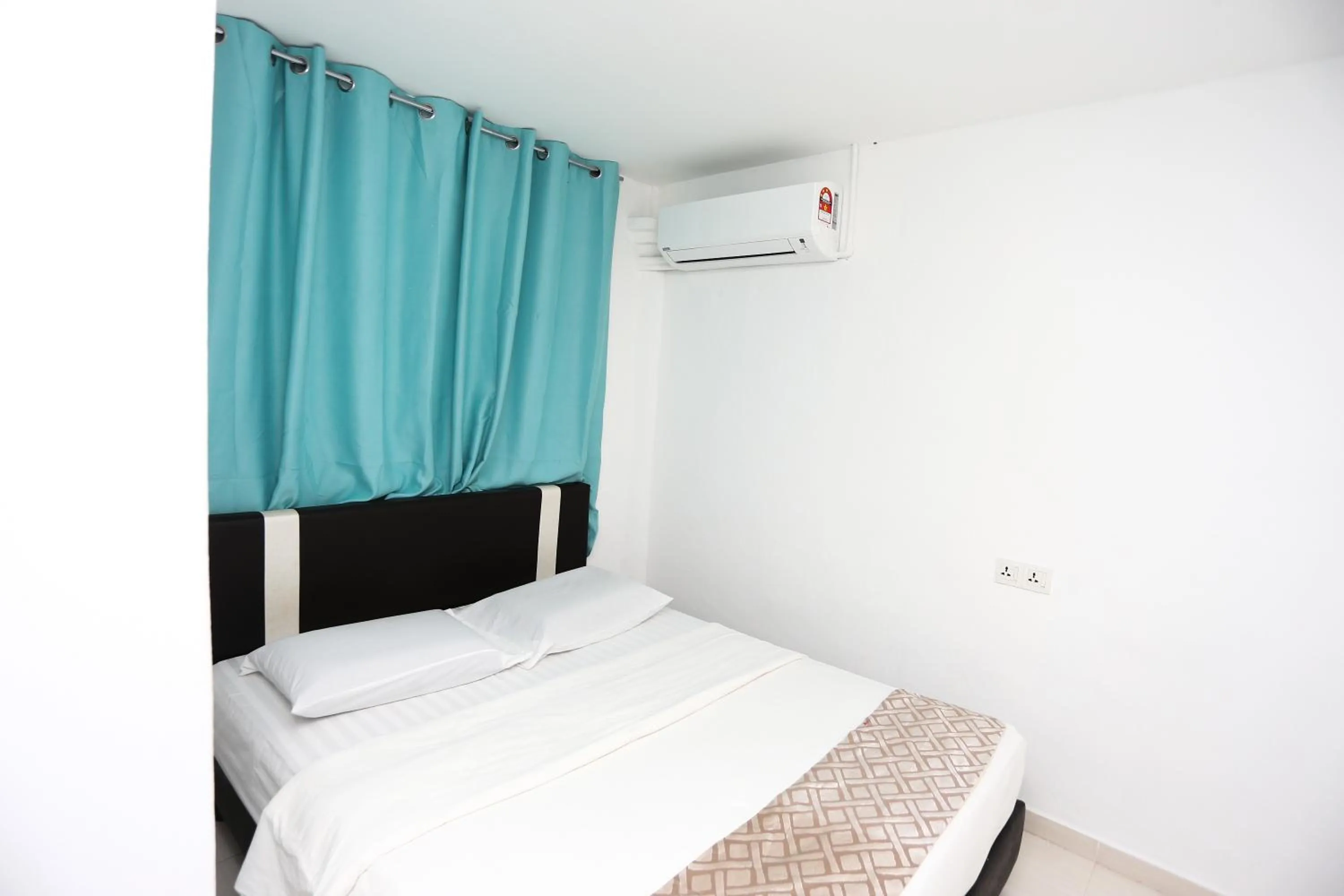 Bed in Pondok Muara Chalet