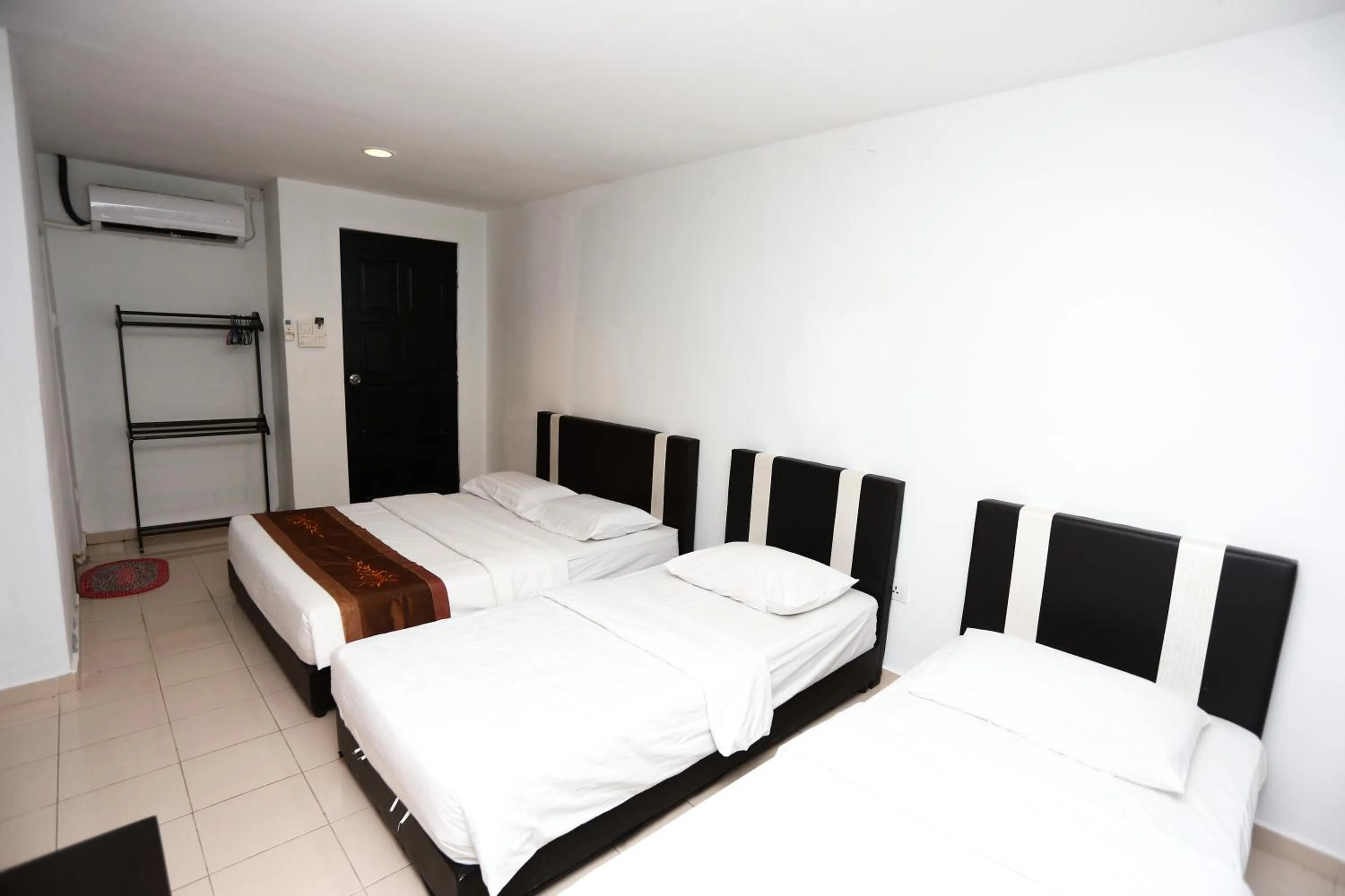 Bed in Pondok Muara Chalet