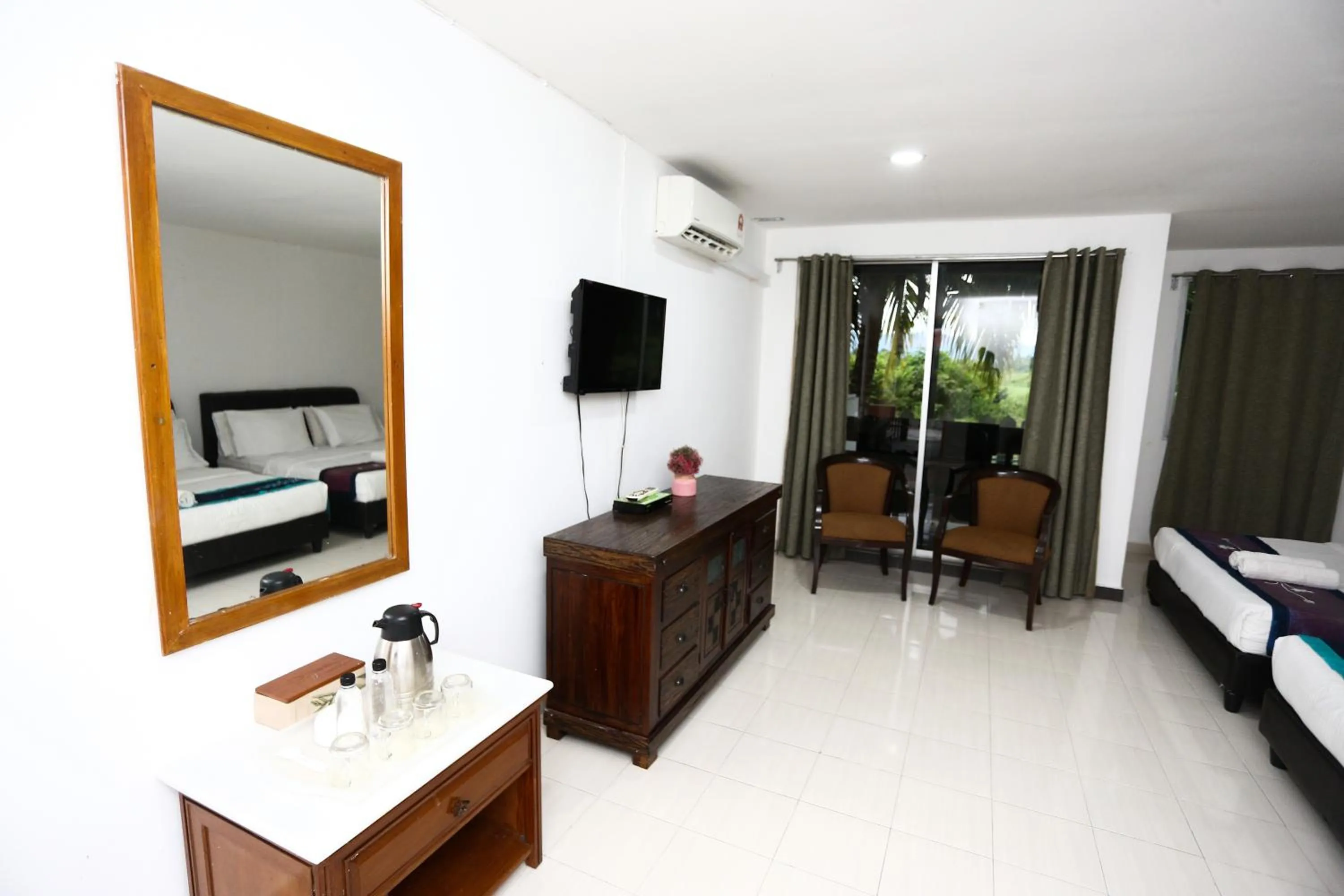 Bed in Pondok Muara Chalet