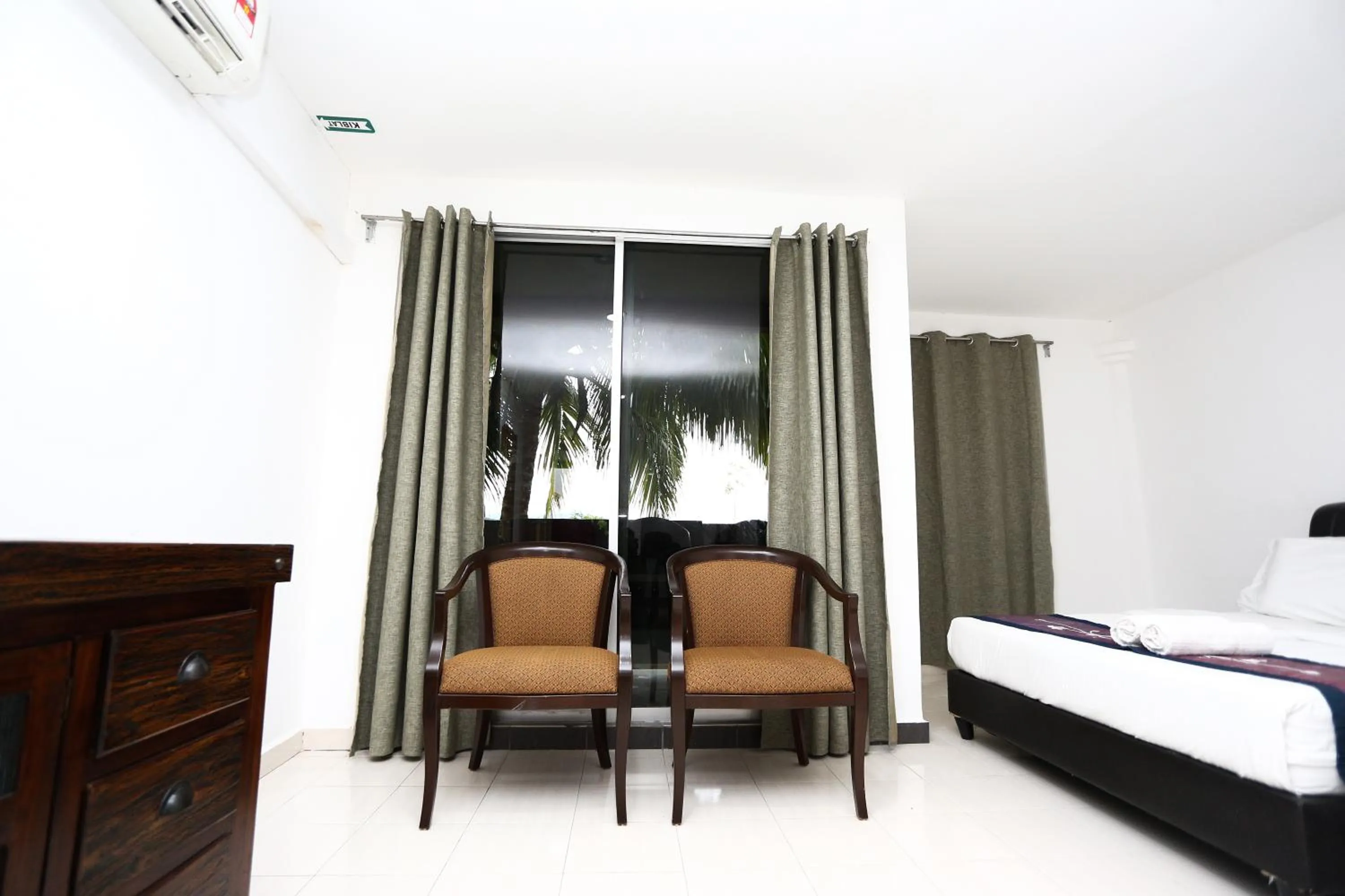 Bed in Pondok Muara Chalet