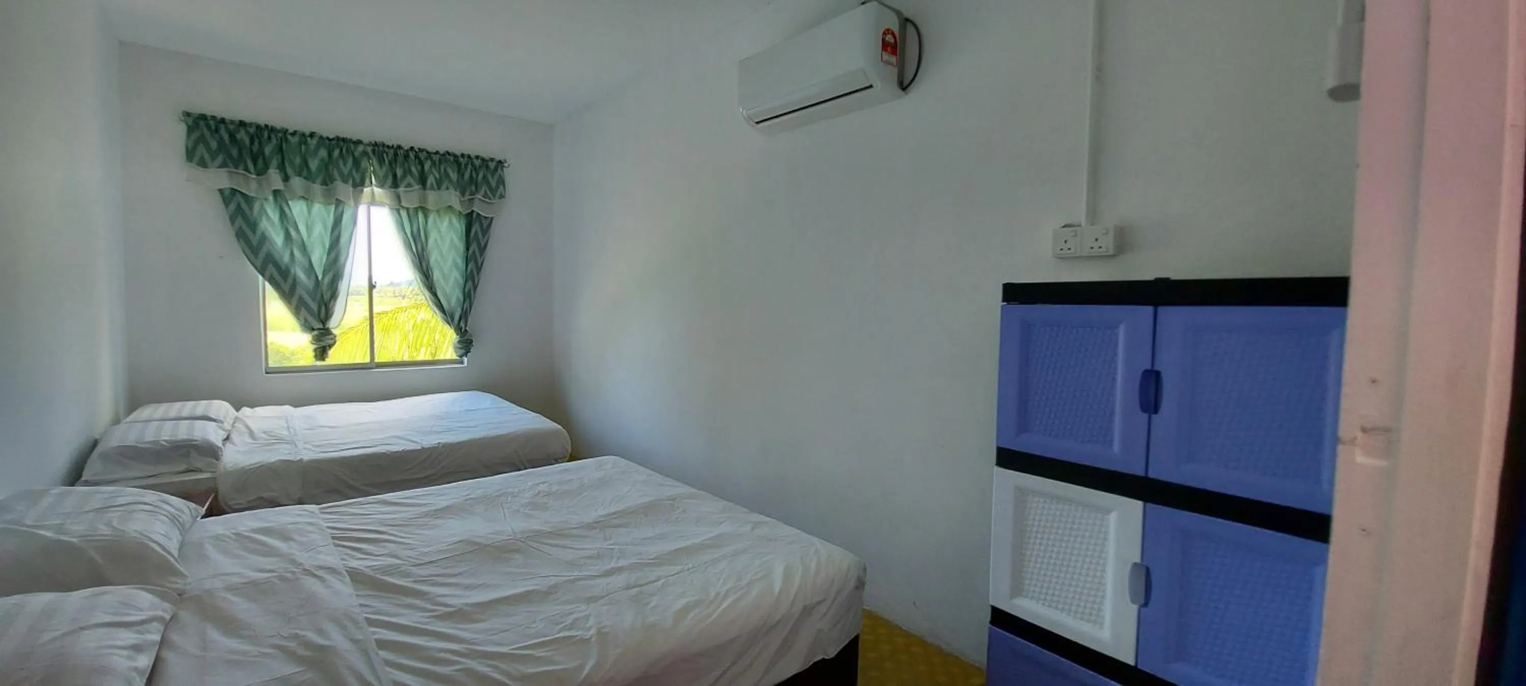 Bed in Pondok Muara Chalet