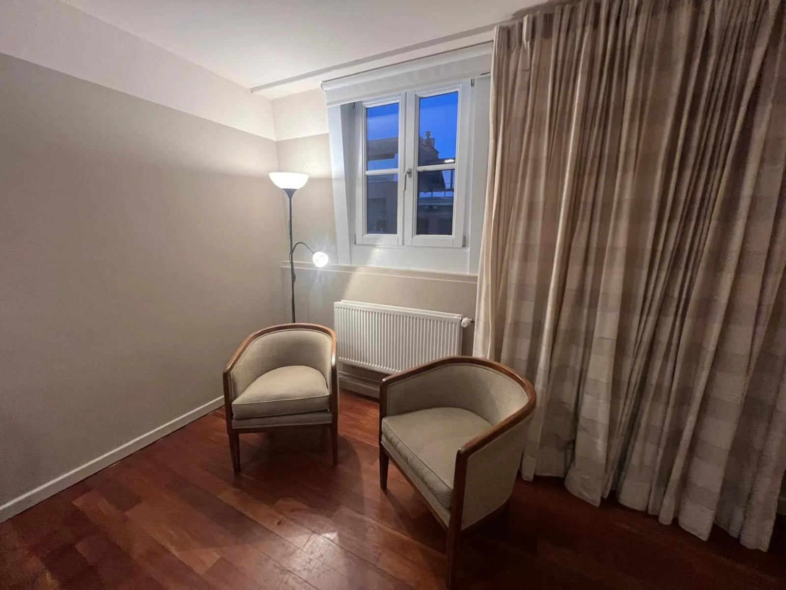 Seating area in Because the Night city lodge