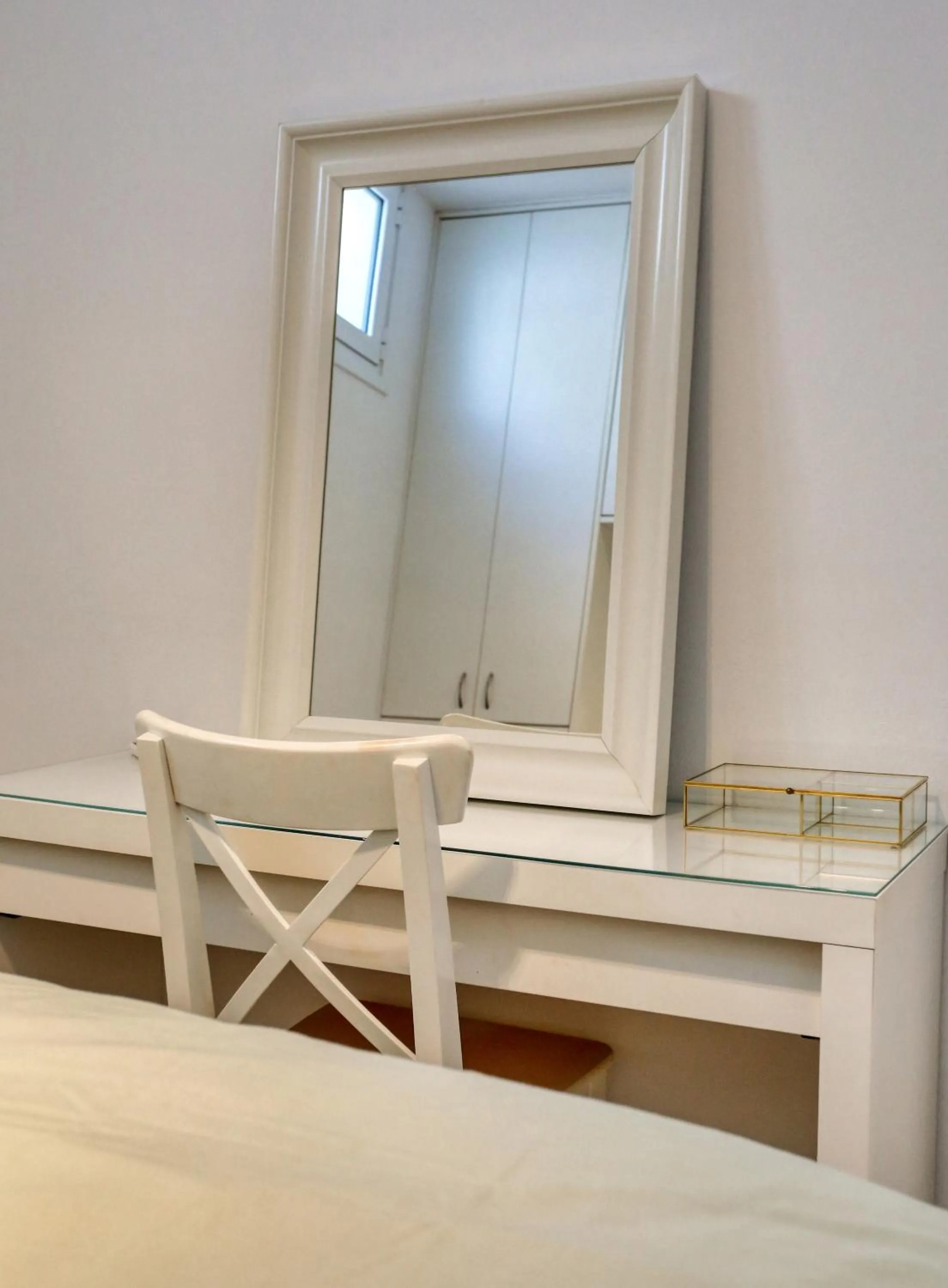 Bed in Helios Studios & Apartments