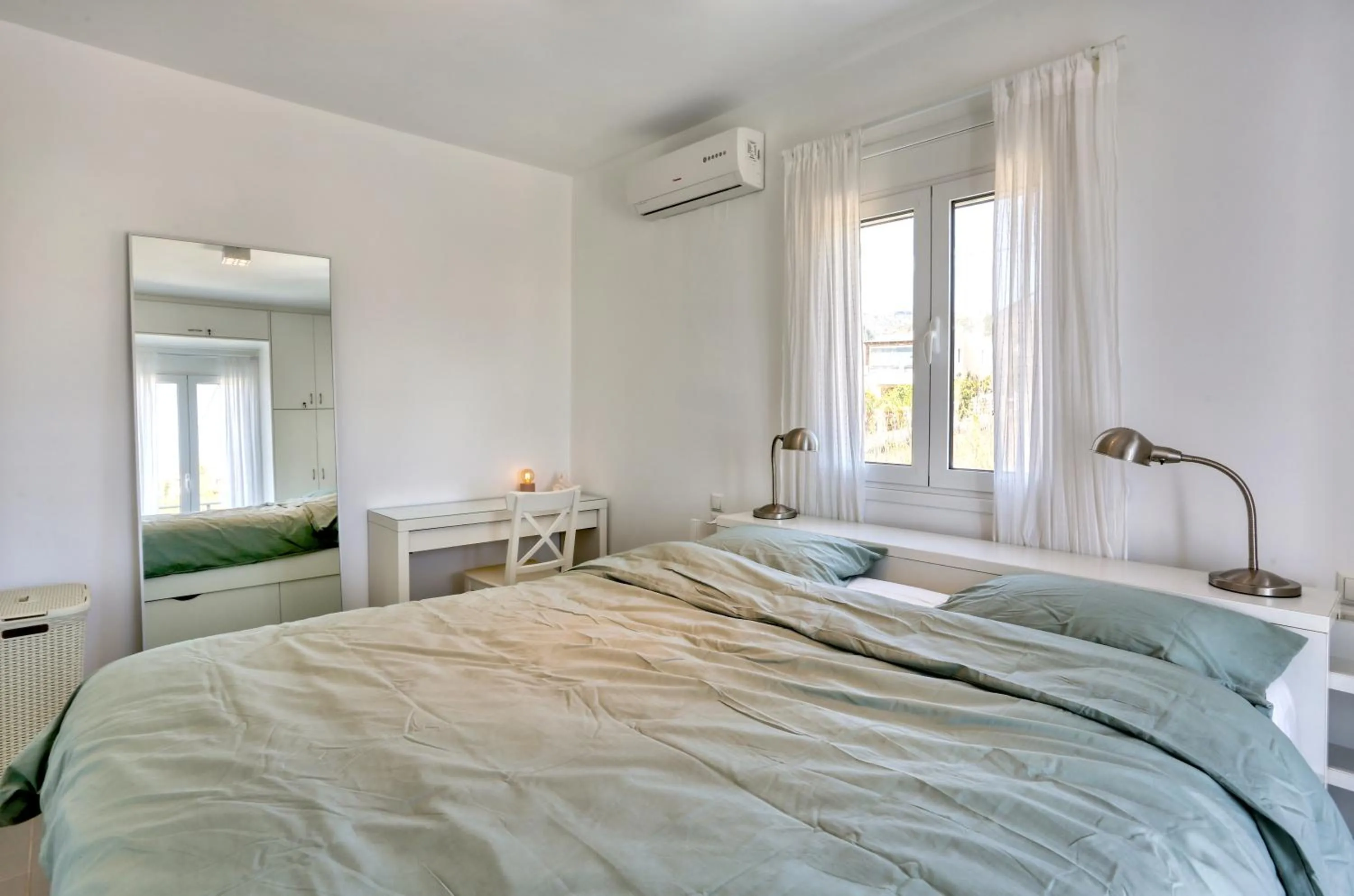 Bed in Helios Studios & Apartments