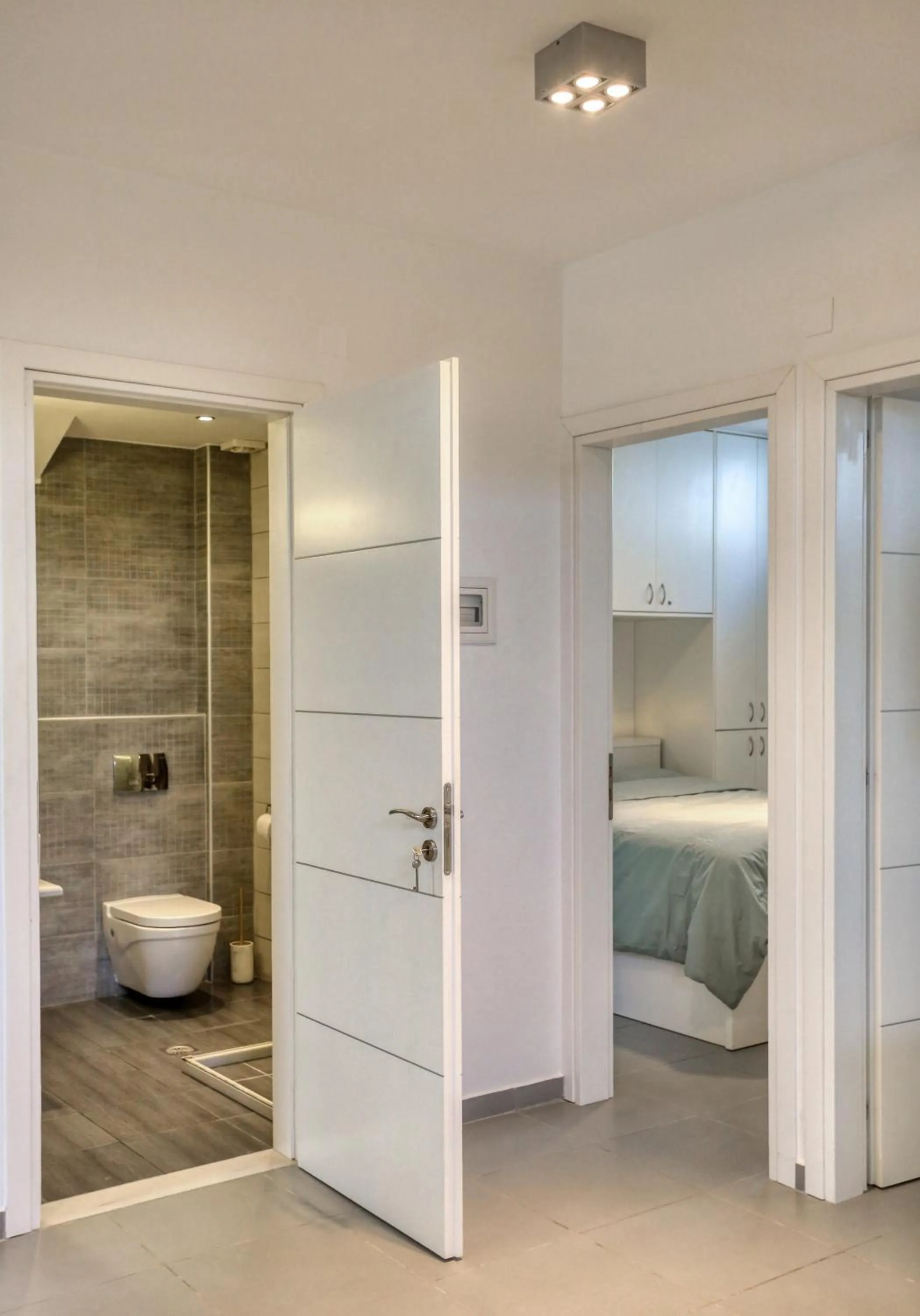 Bed in Helios Studios & Apartments