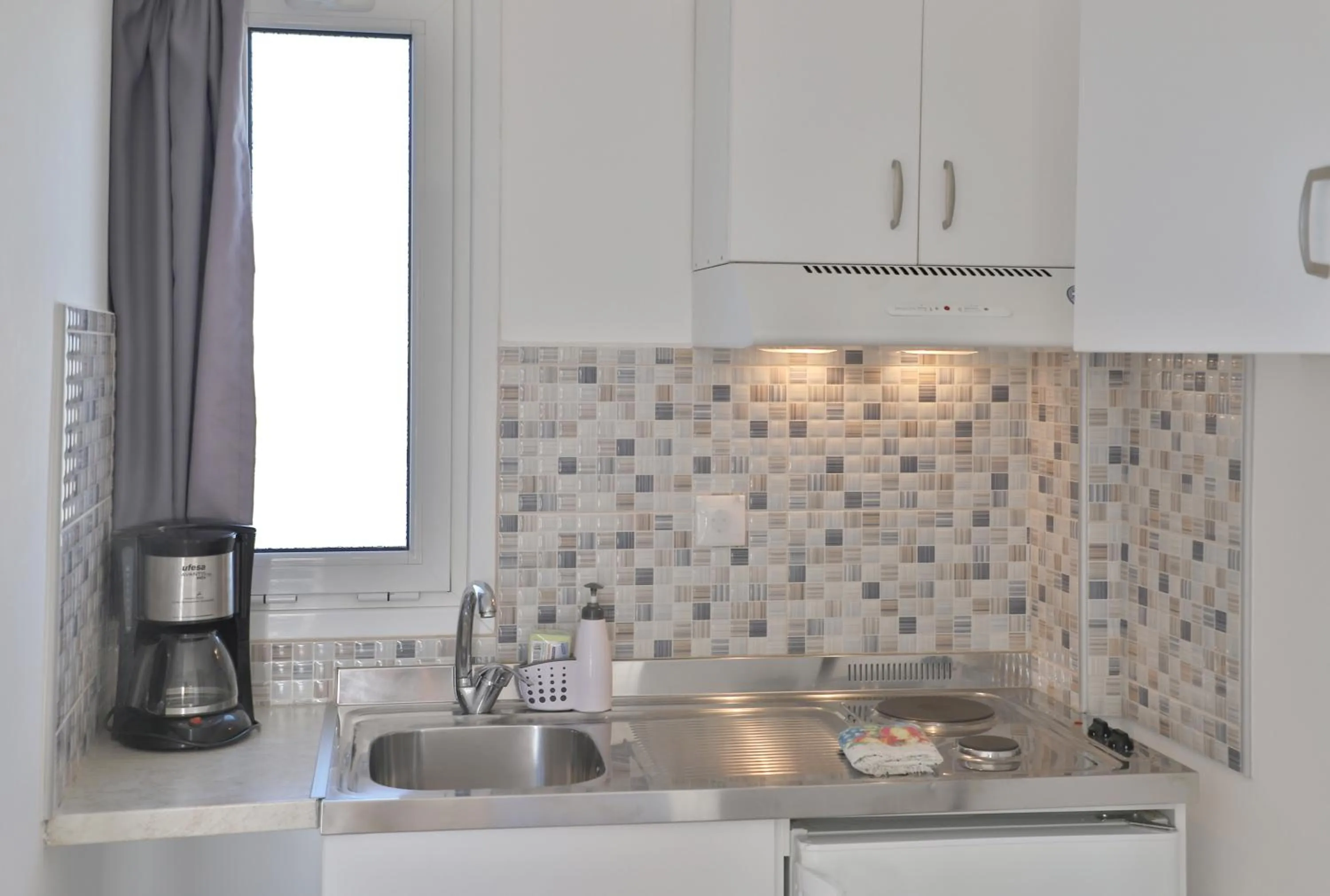 Helios Studios & Apartments