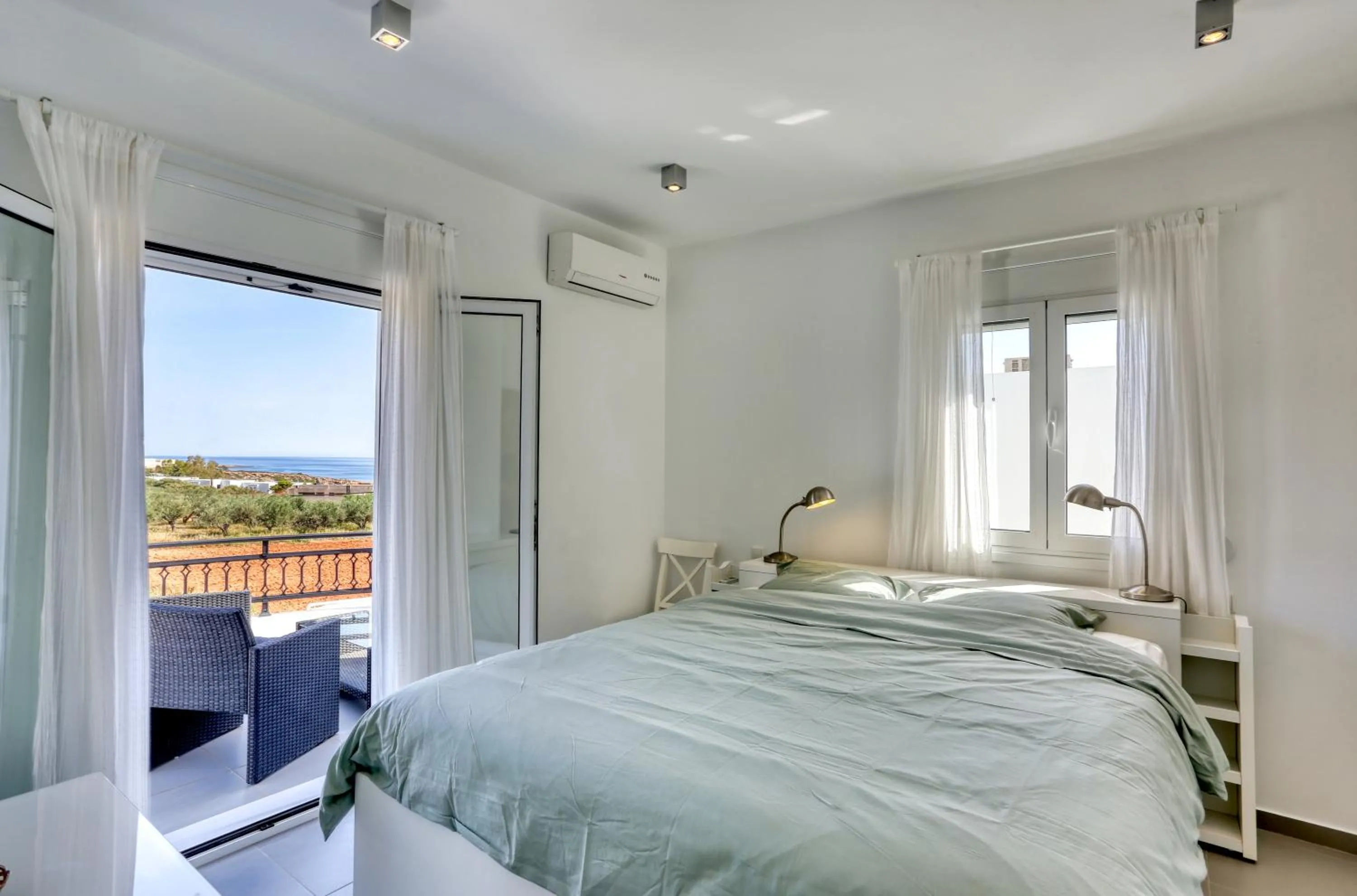 Bed in Helios Studios & Apartments