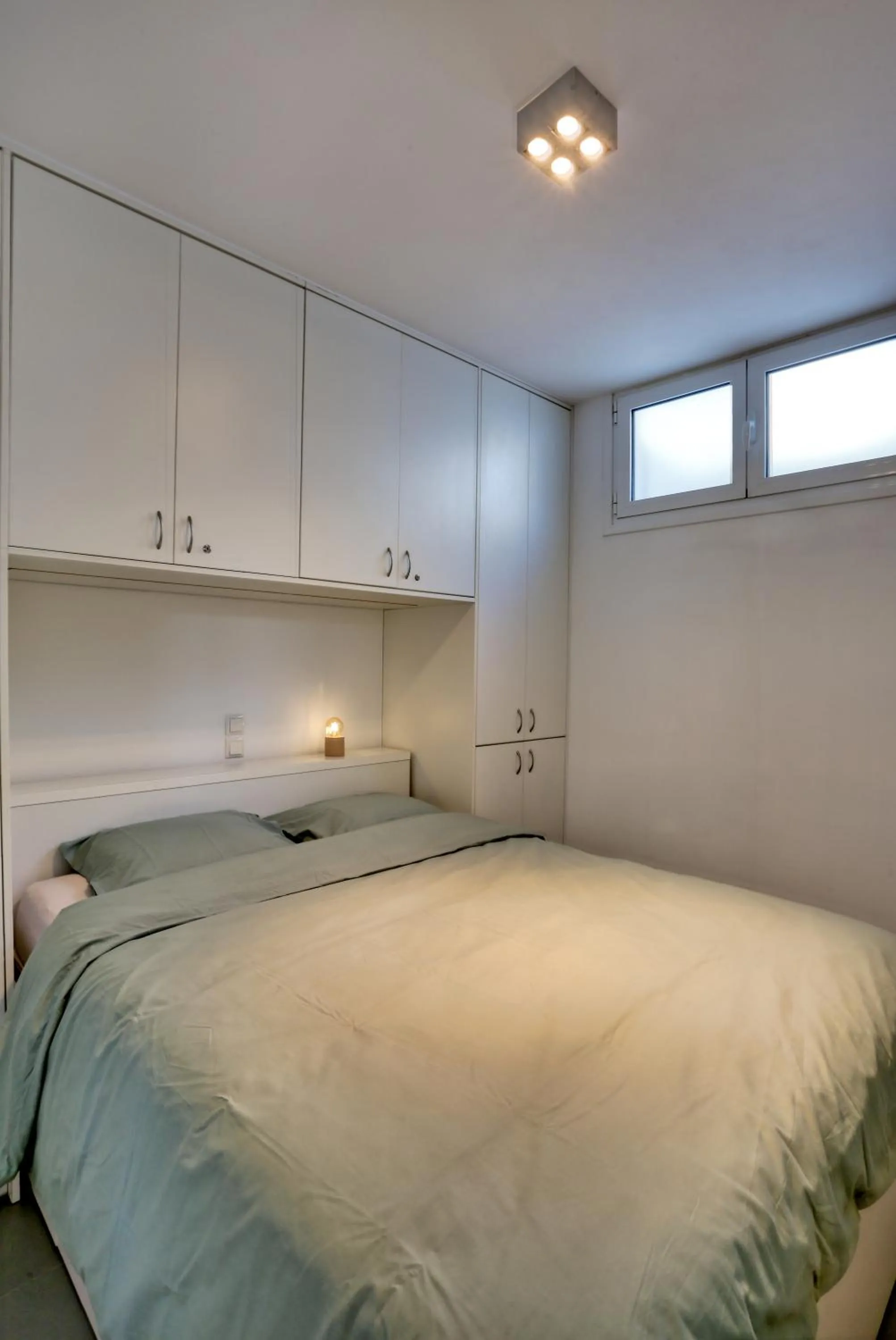 Bed in Helios Studios & Apartments