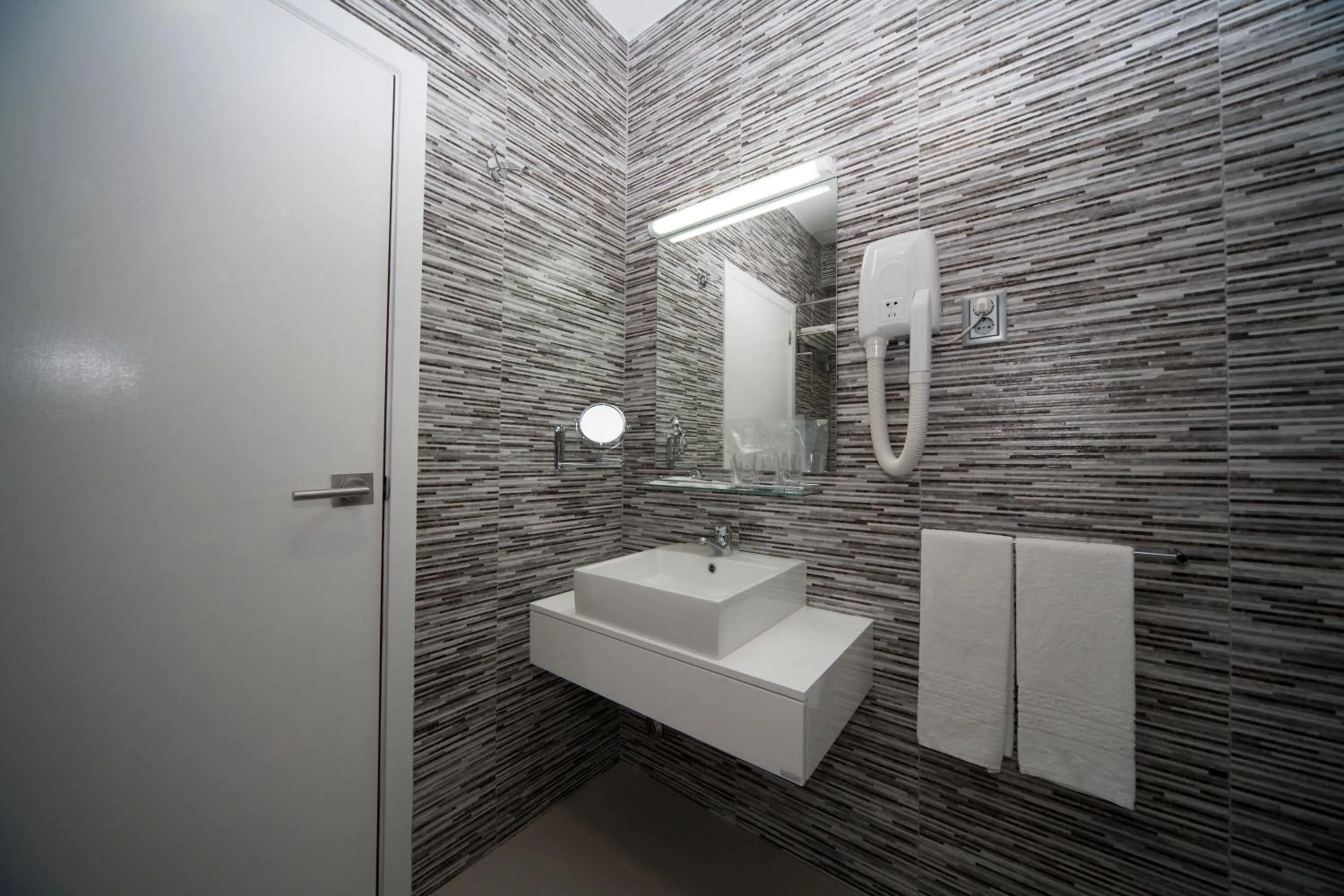 Toilet in Hotel Feira Pedra Bela