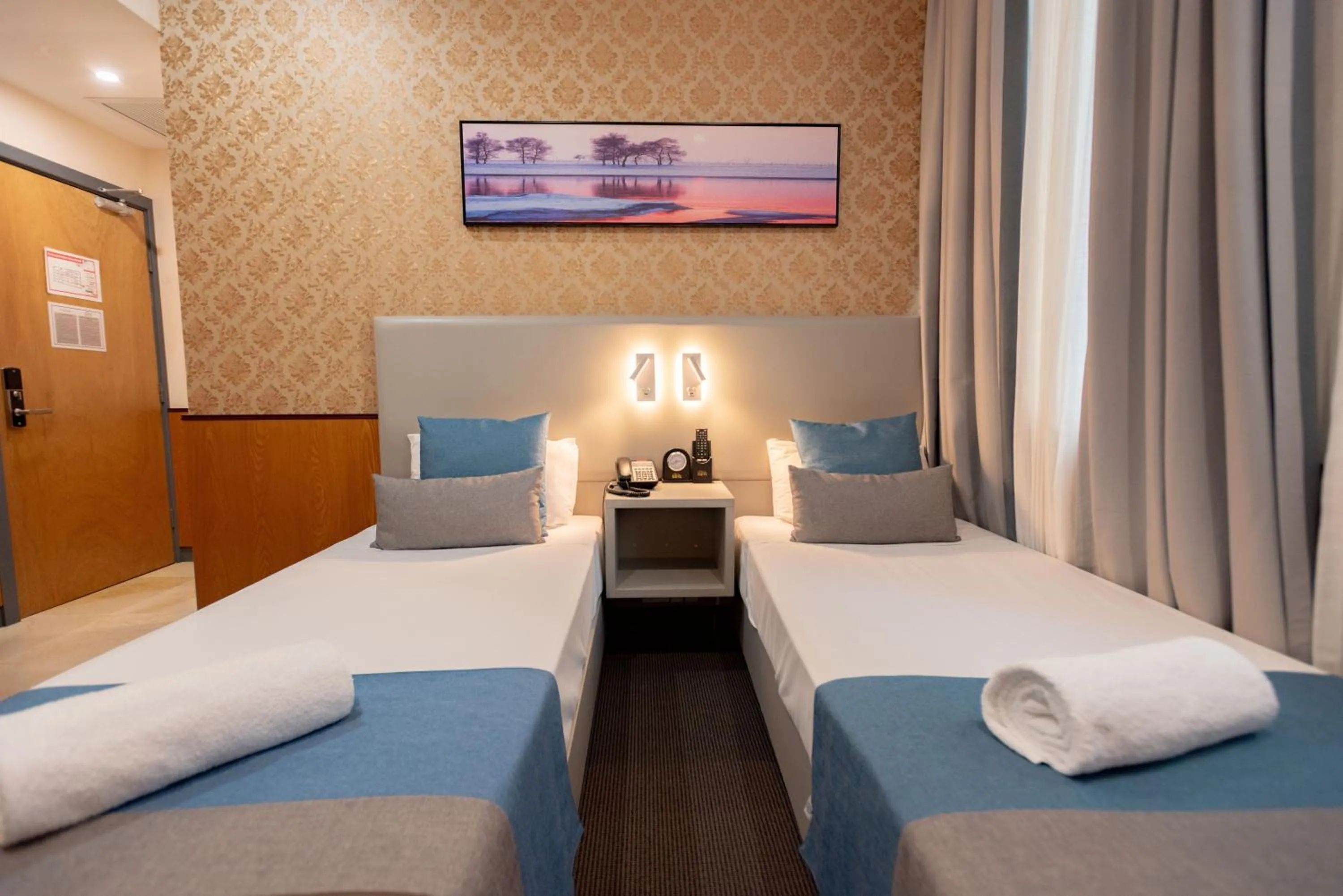 Bed in YEHS Hotel Sydney QVB