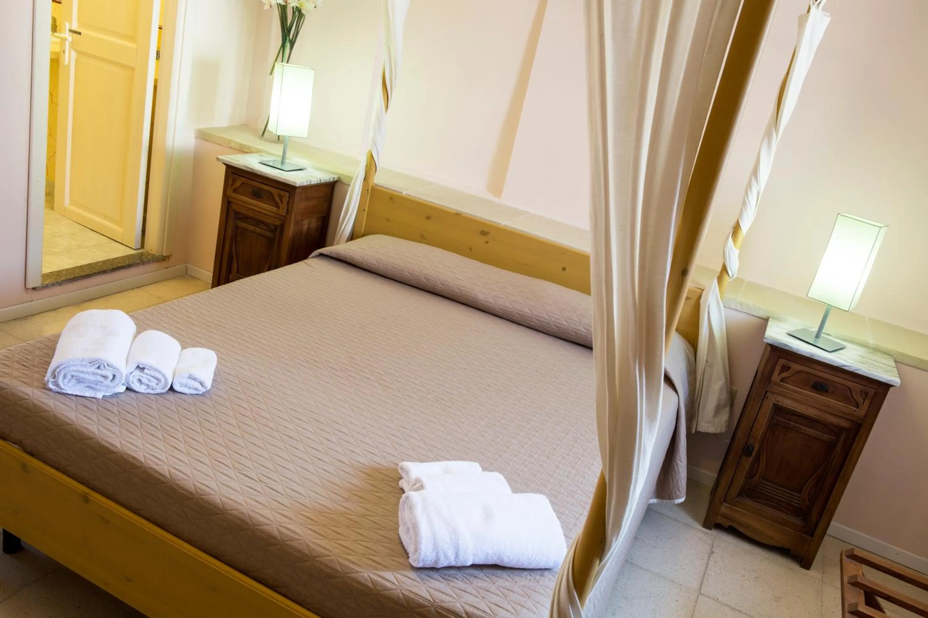 Bed in B&B Dimora Muzio and Restaurant