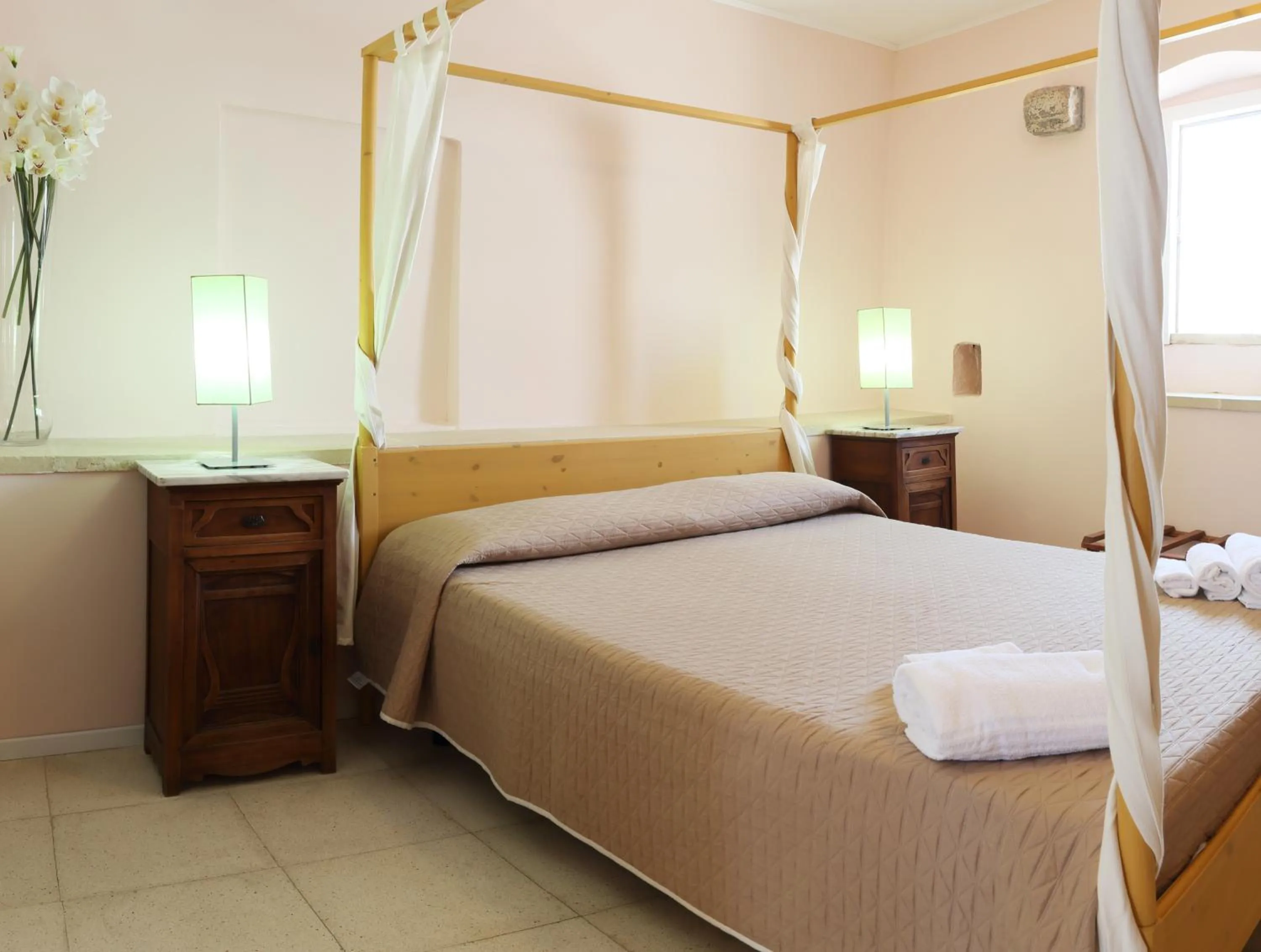 Bed in B&B Dimora Muzio and Restaurant