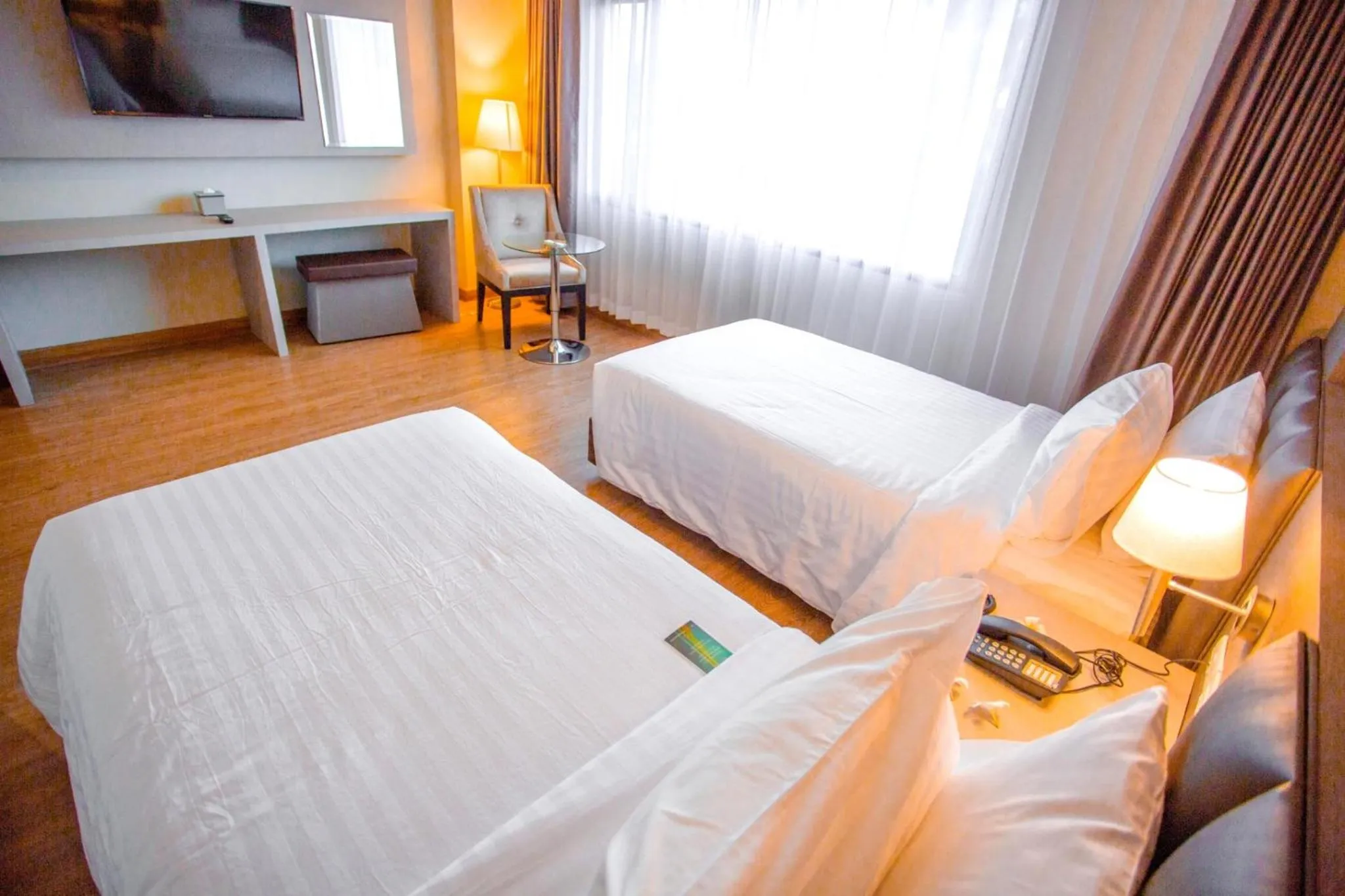 Bed in The Cheewin Hotel And Convention