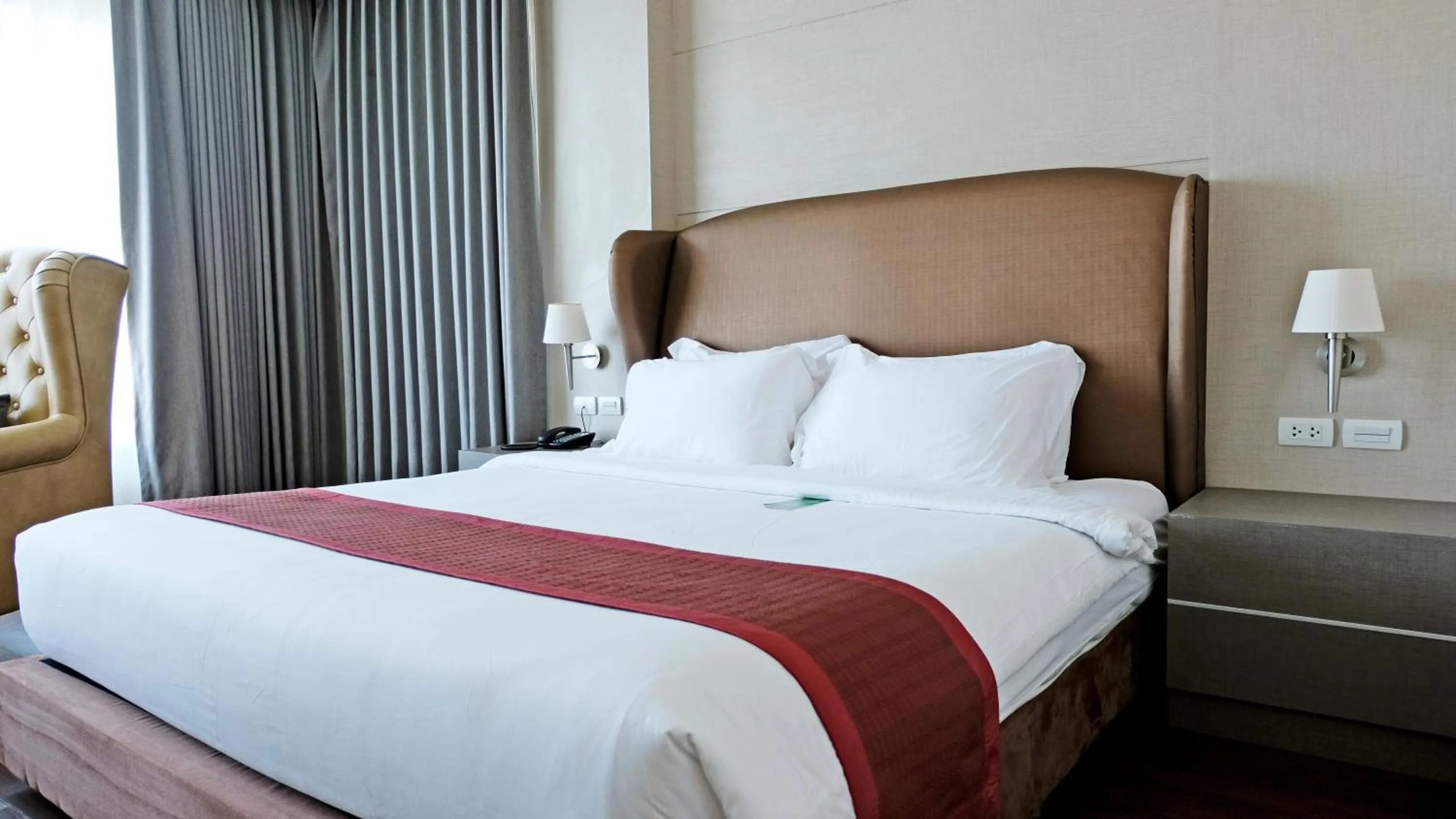 Bed in The Cheewin Hotel And Convention