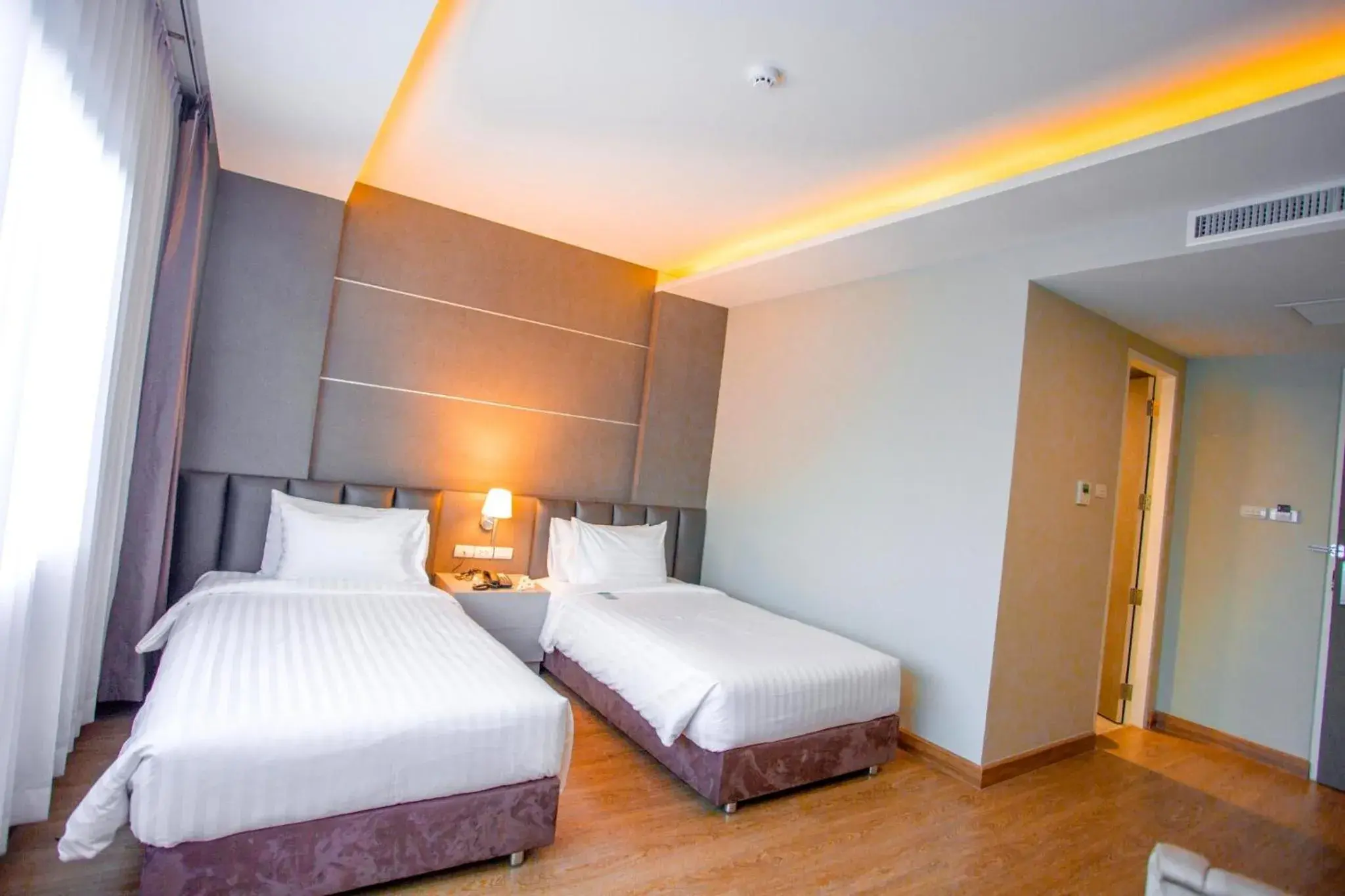 Deluxe Twin Room in The Cheewin Hotel And Convention Deluxe Twin Room in The Cheewin Hotel And Convention