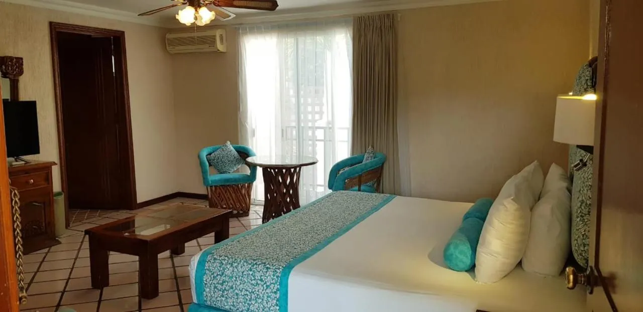 Bed in Hotel Posada Quinta Las Flores