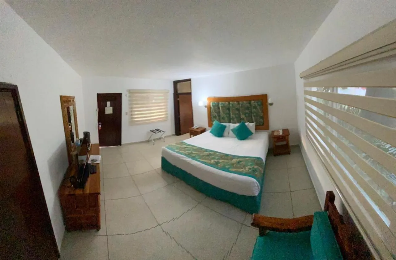 Photo of the whole room, Bed in Hotel Posada Quinta Las Flores