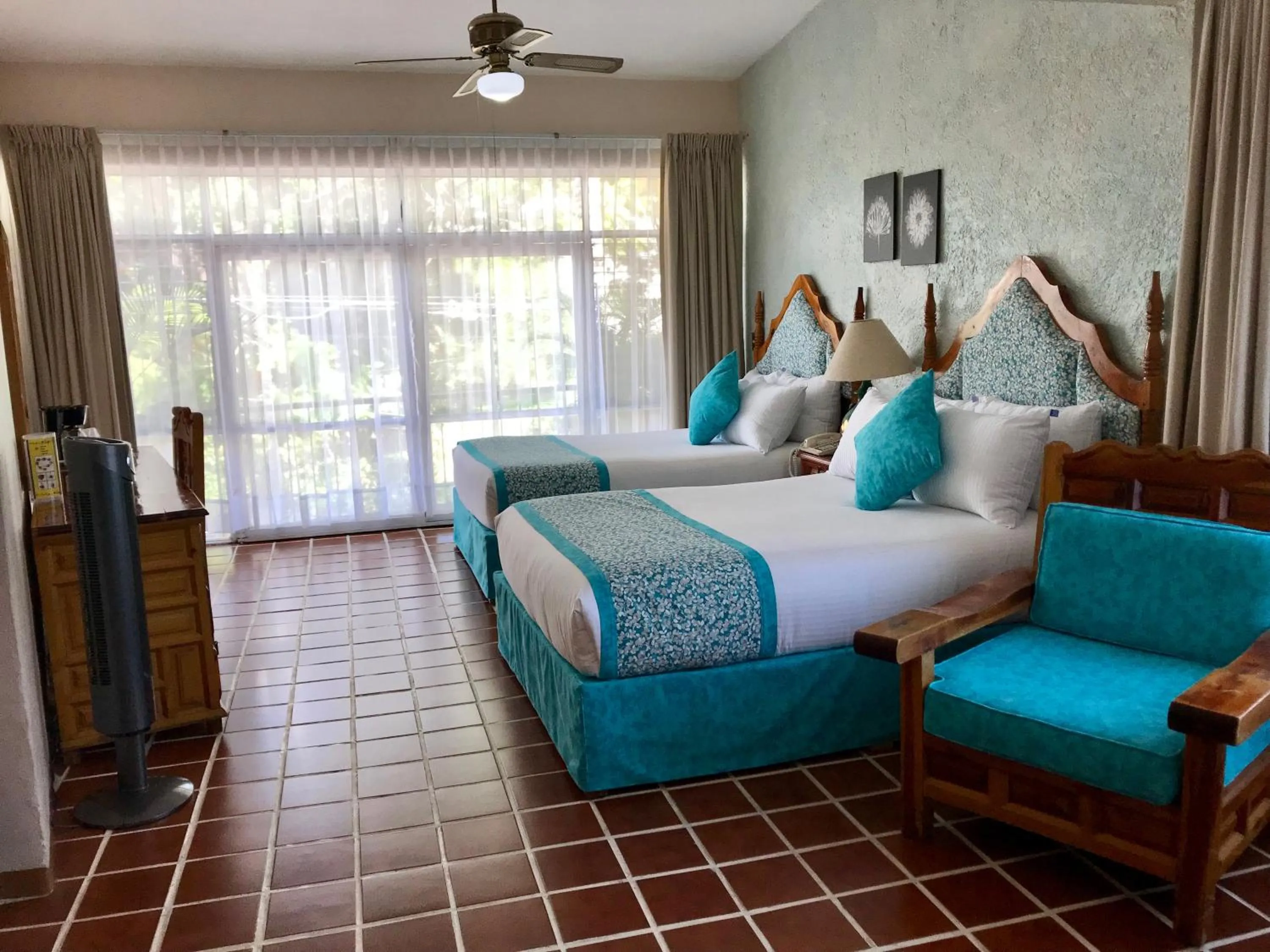 Photo of the whole room, Bed in Hotel Posada Quinta Las Flores
