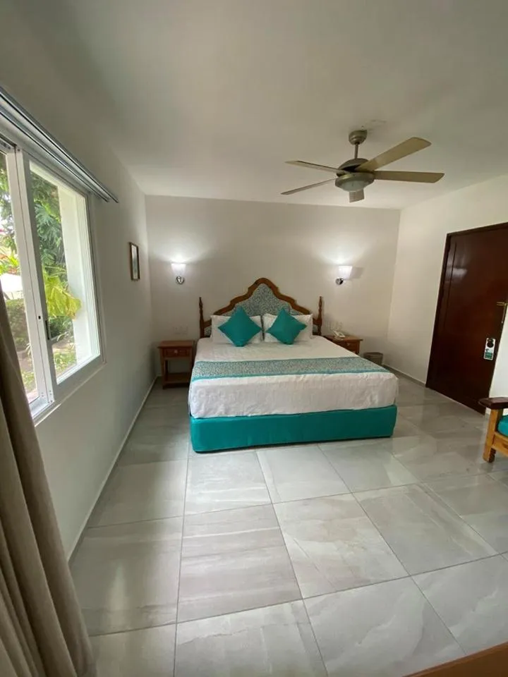 Bed in Hotel Posada Quinta Las Flores