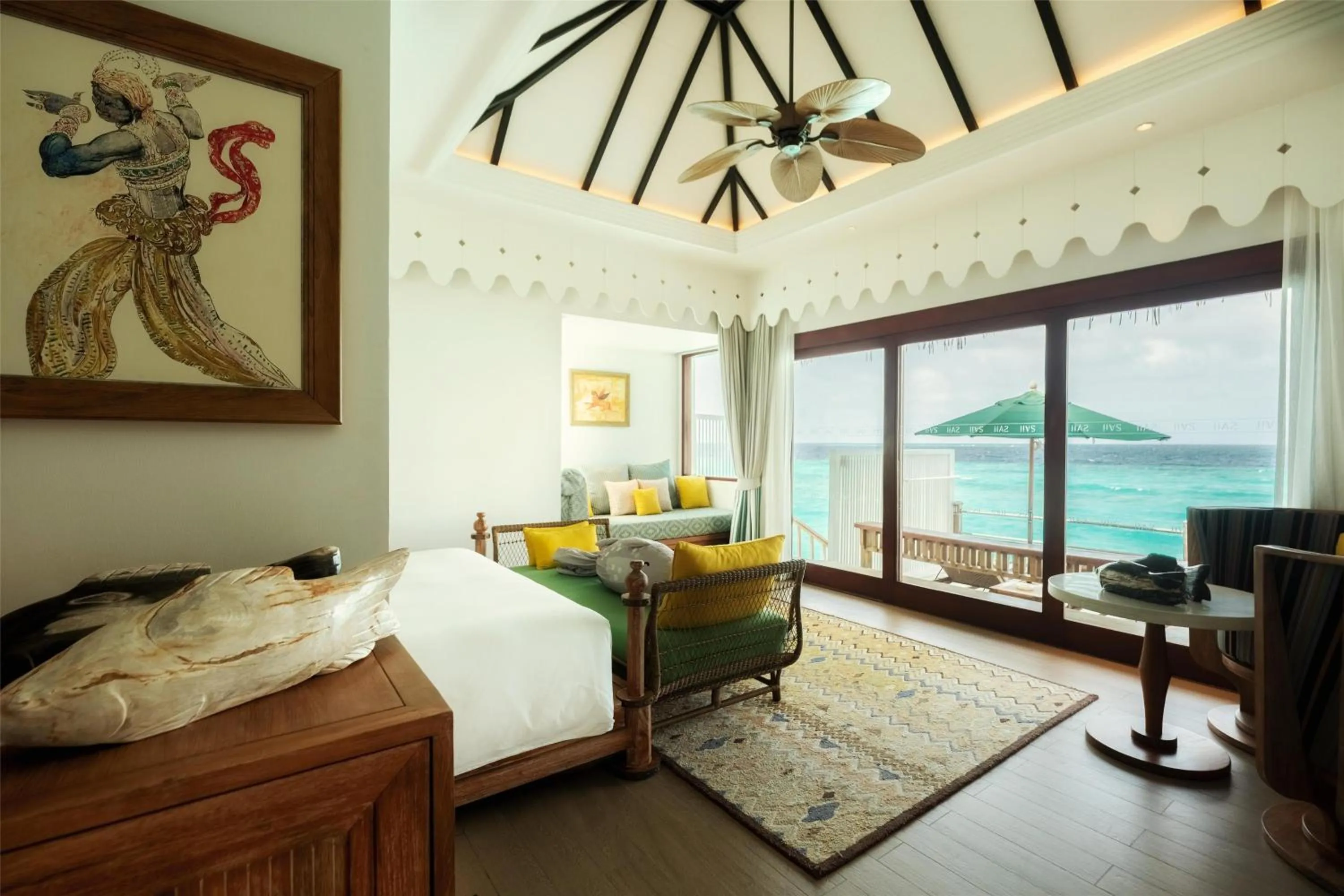 Living room, Bed in SAii Lagoon Maldives, Curio Collection By Hilton