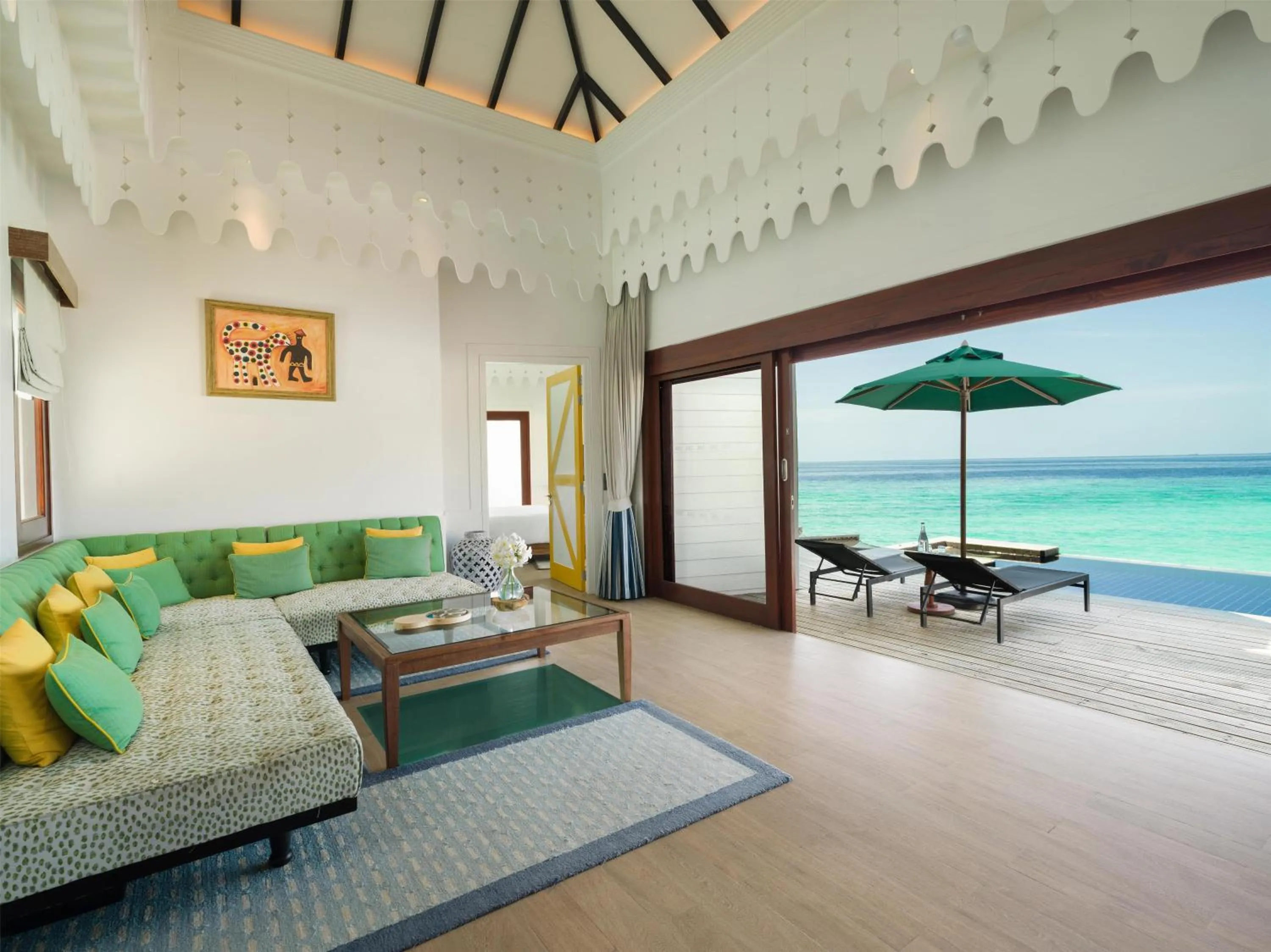 Living room in SAii Lagoon Maldives, Curio Collection By Hilton