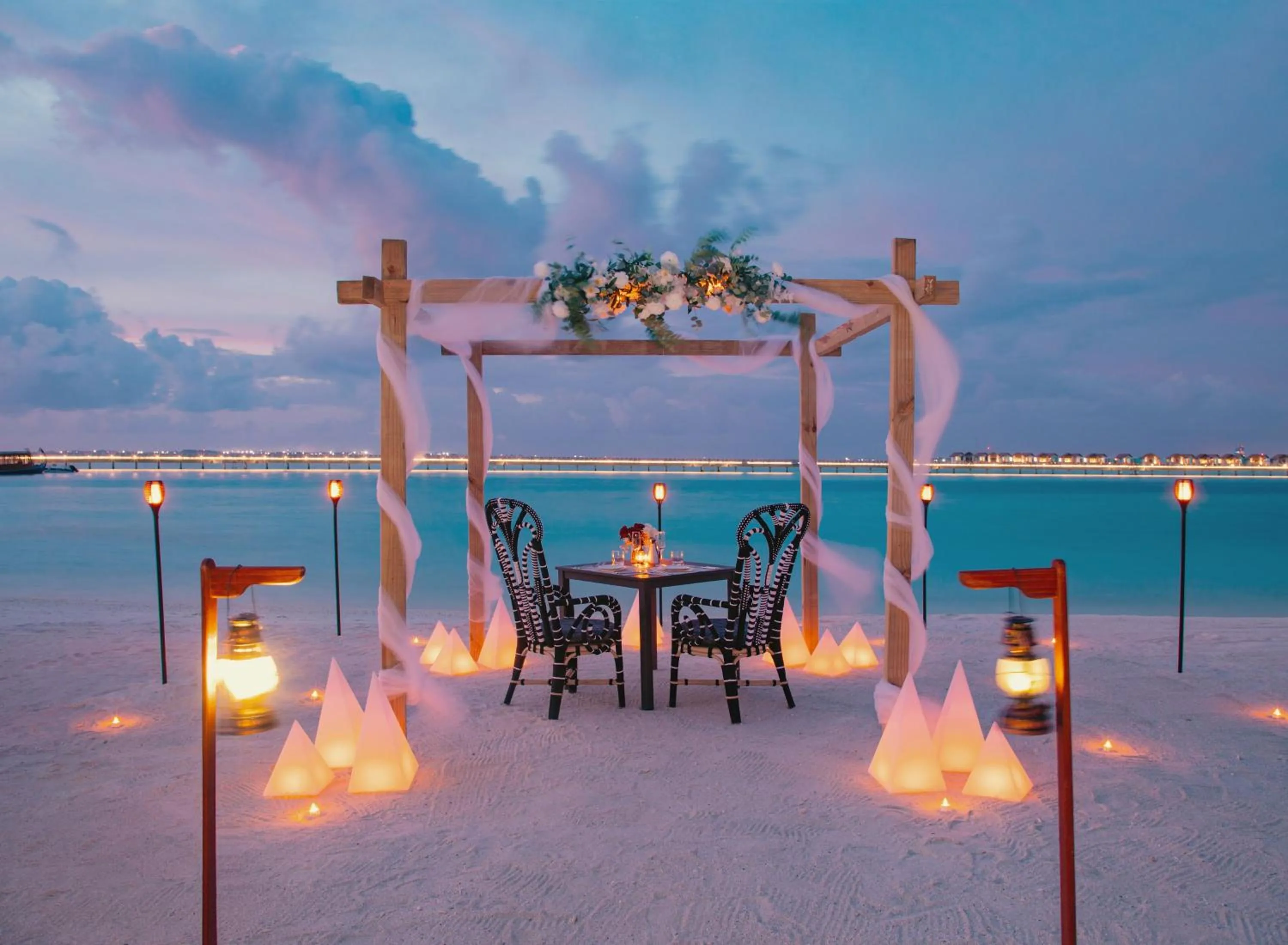 Dining area in SAii Lagoon Maldives, Curio Collection By Hilton