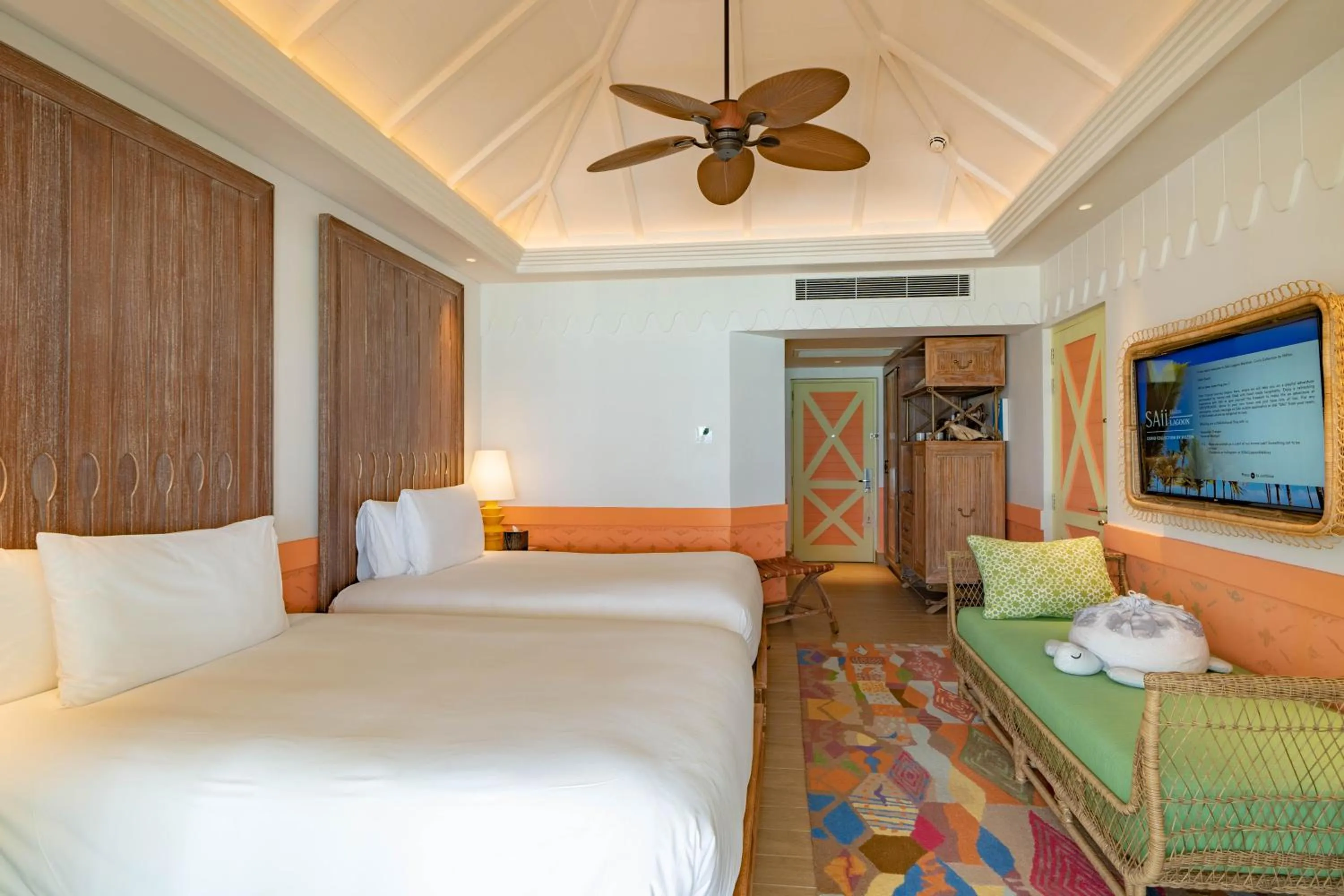 TV and multimedia, Bed in SAii Lagoon Maldives, Curio Collection By Hilton