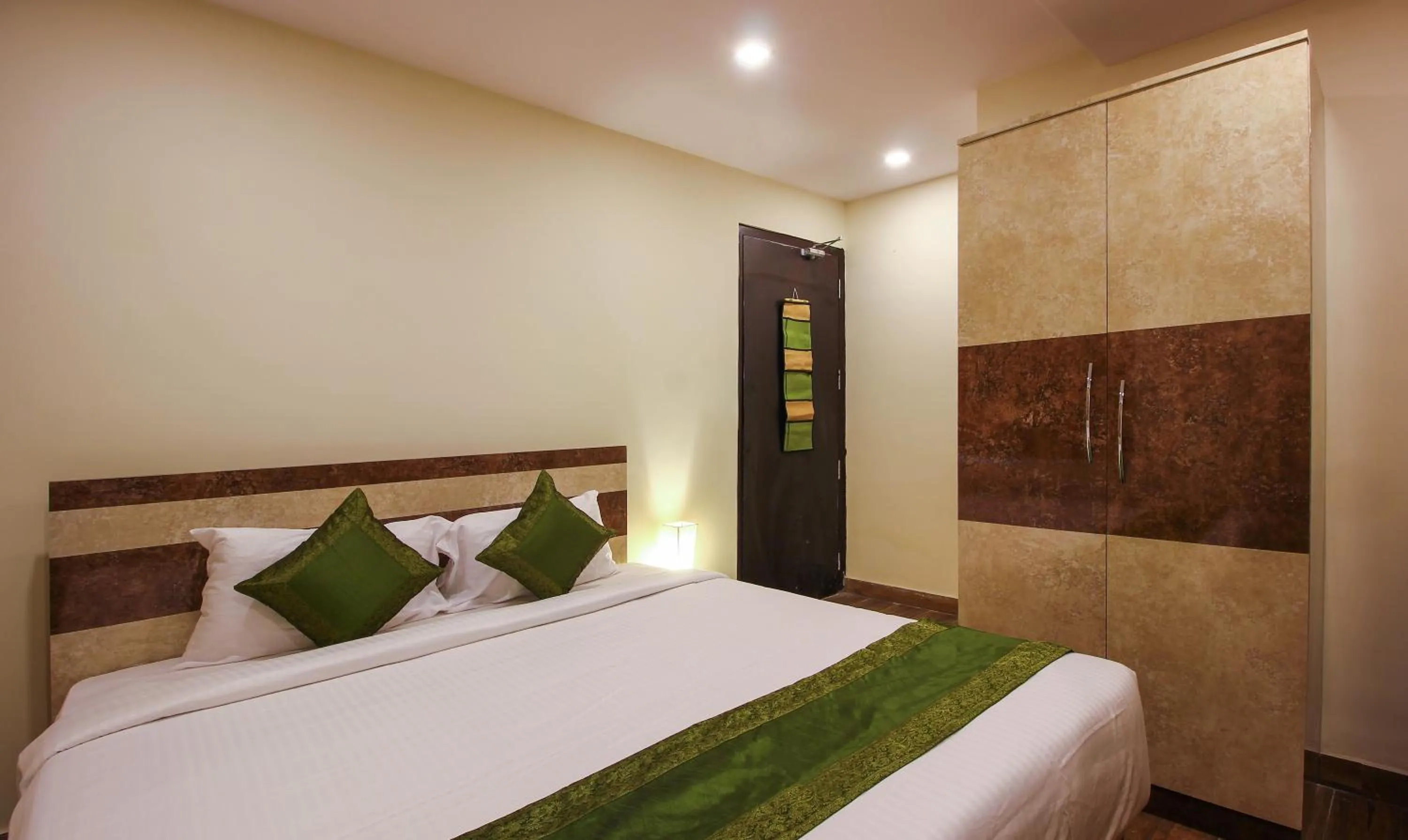 Bedroom, Bed in Treebo Address Inn, Banjara Hills