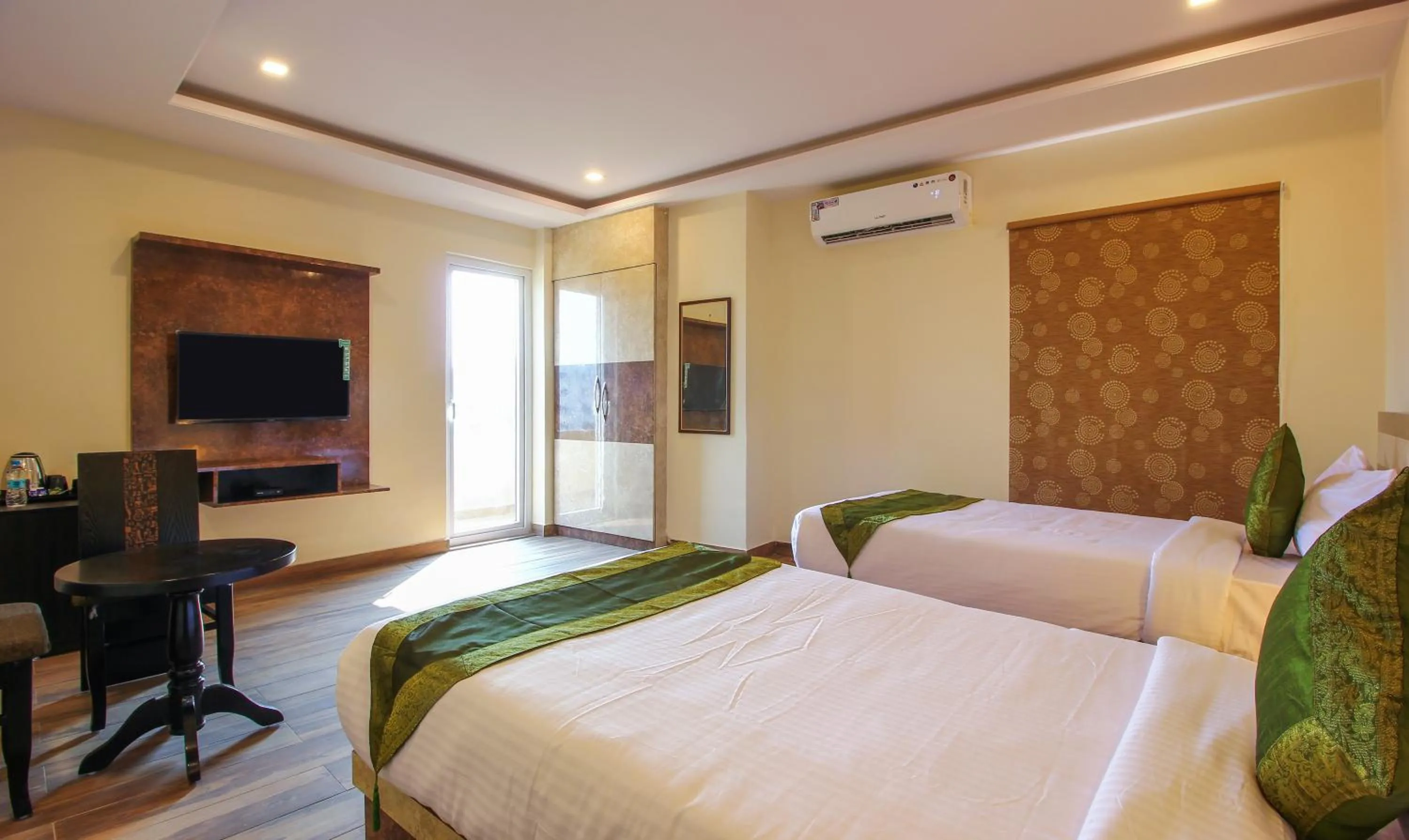 Photo of the whole room, Bed in Treebo Address Inn, Banjara Hills