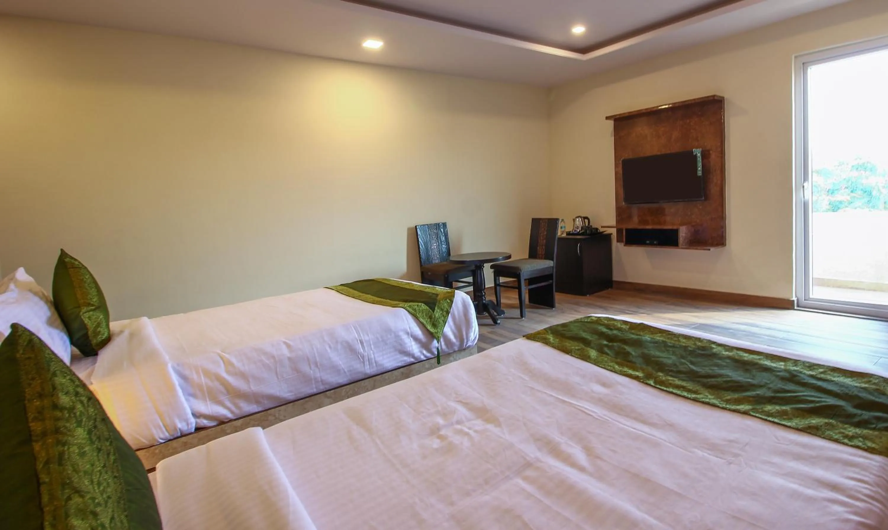 Bedroom, Bed in Treebo Address Inn, Banjara Hills