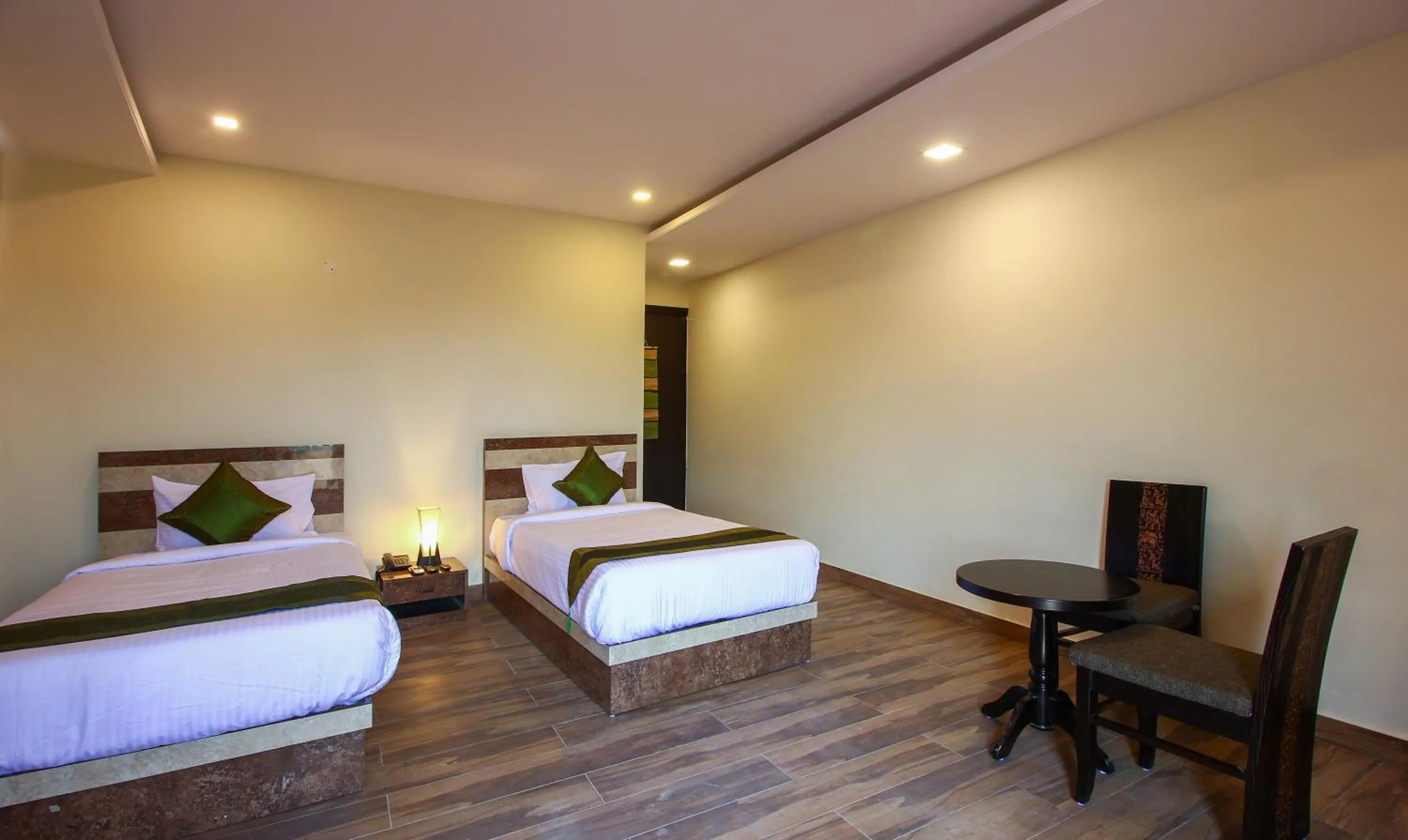 Bedroom, Bed in Treebo Address Inn, Banjara Hills