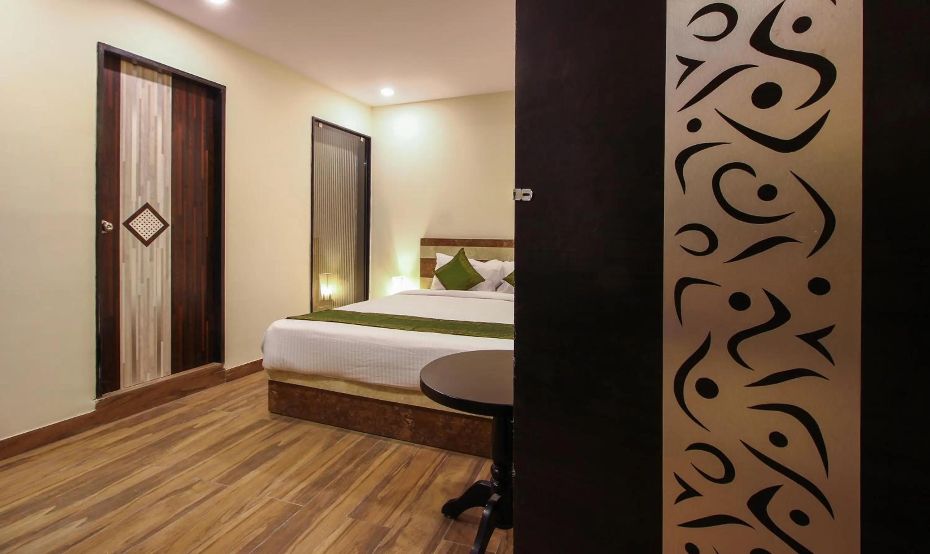 Bedroom, Bed in Treebo Address Inn, Banjara Hills