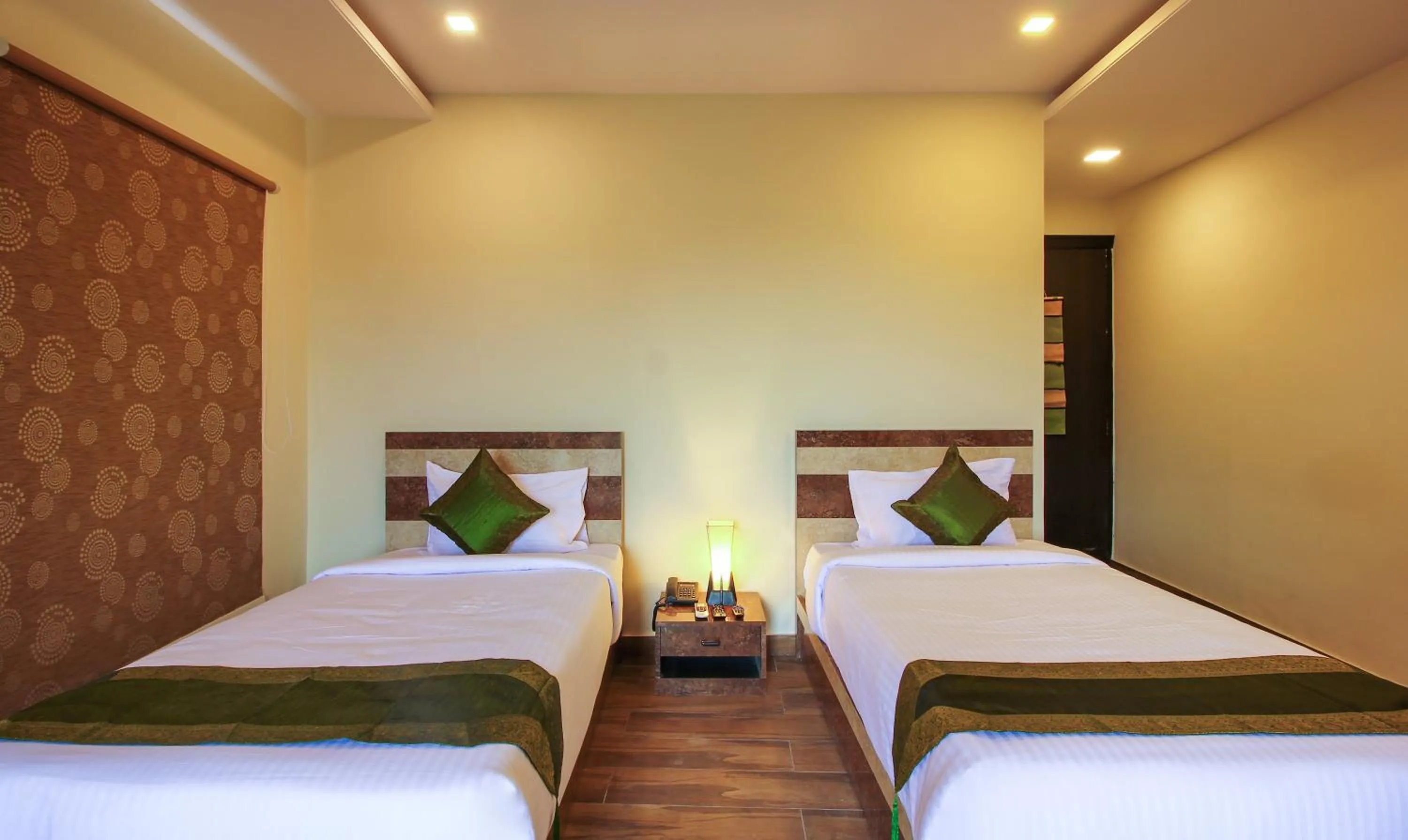 Bedroom, Bed in Treebo Address Inn, Banjara Hills