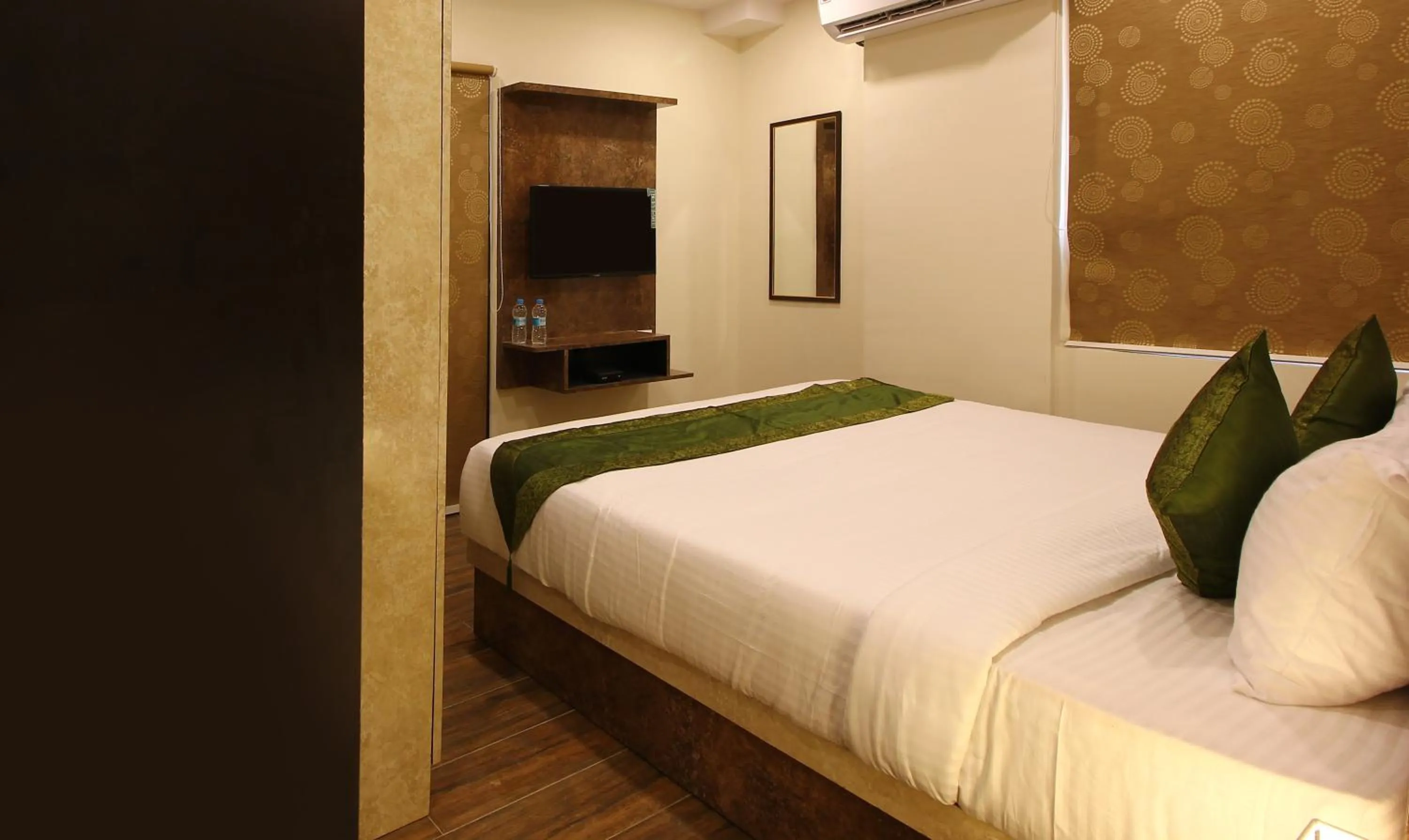 Bedroom, Bed in Treebo Address Inn, Banjara Hills