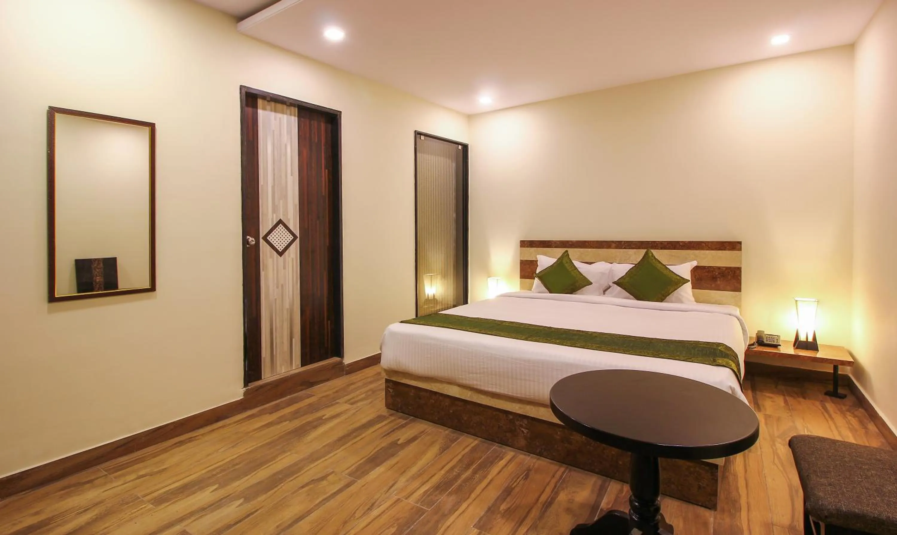 Photo of the whole room, Bed in Treebo Address Inn, Banjara Hills