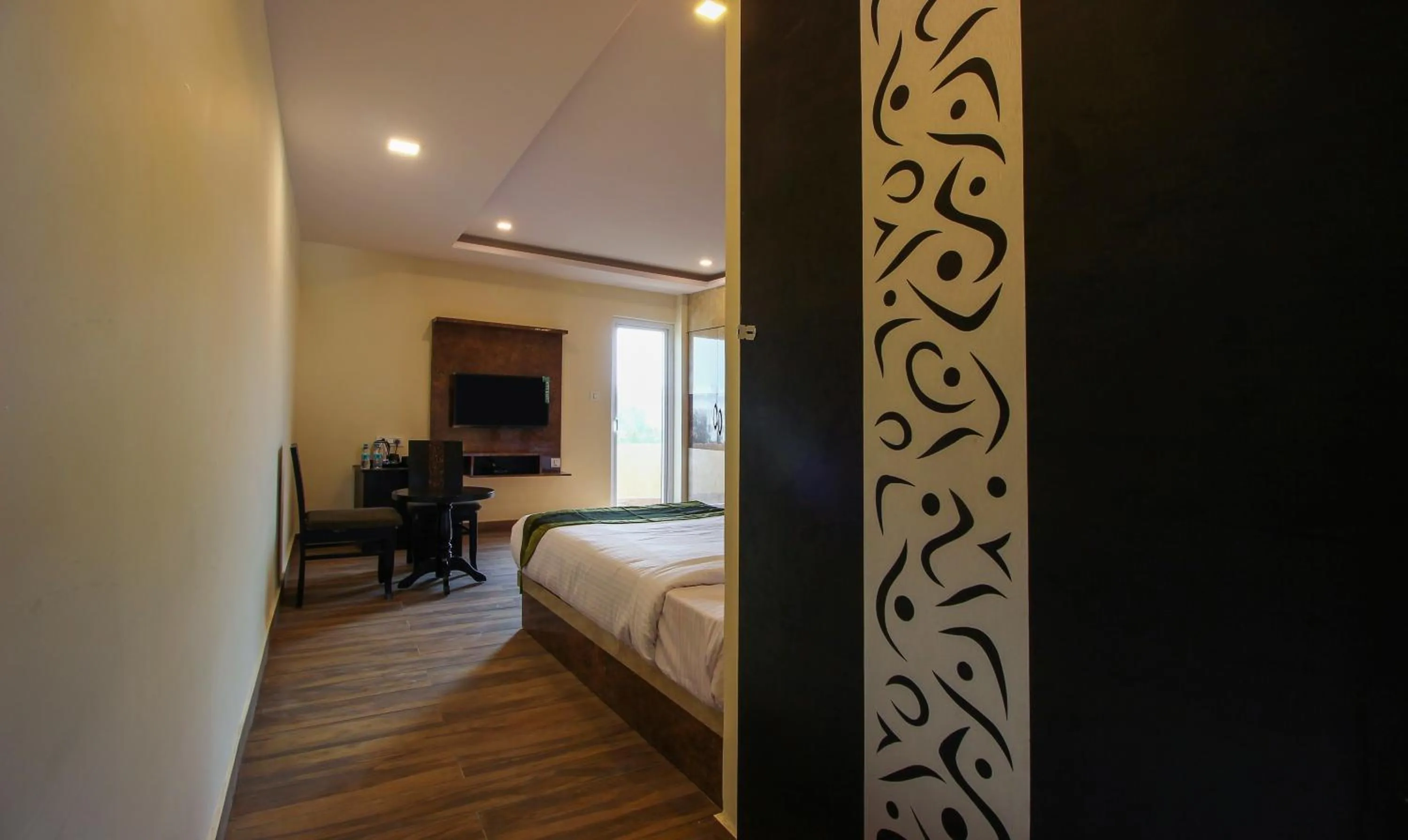 Bedroom, Bed in Treebo Address Inn, Banjara Hills