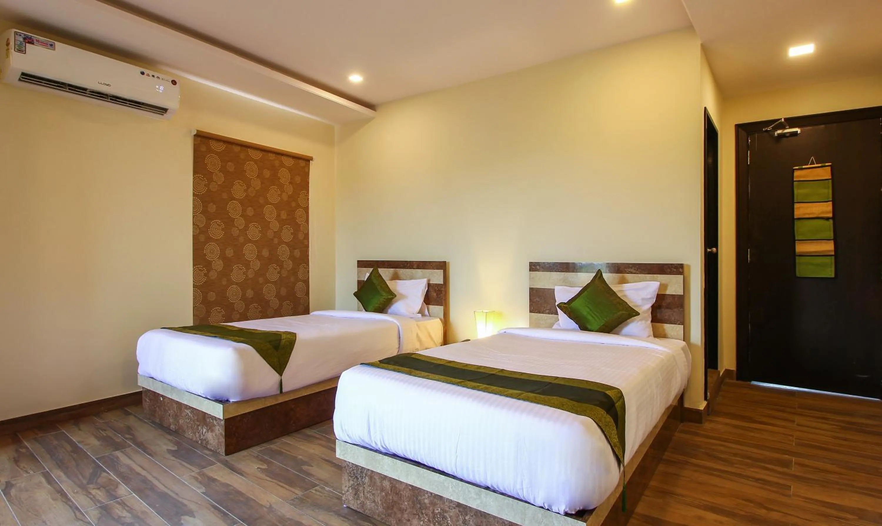 Bedroom, Bed in Treebo Address Inn, Banjara Hills