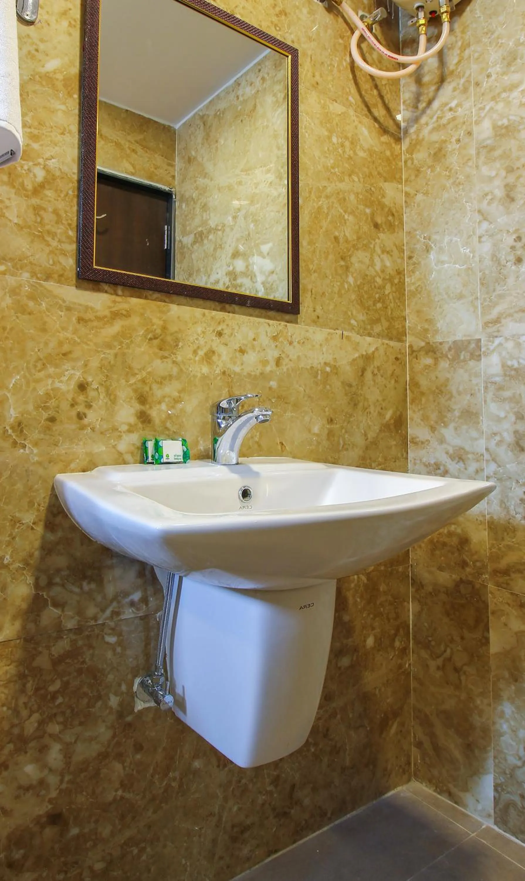 Bathroom in Treebo Address Inn, Banjara Hills